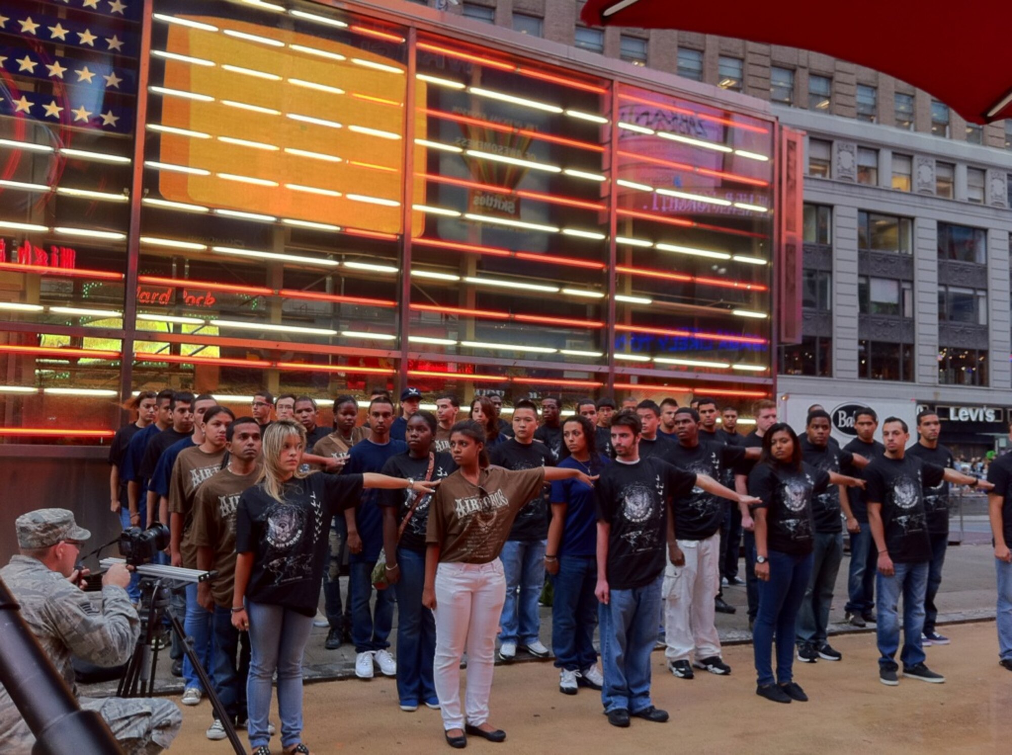 NEW YORK, N.Y. – Forty Delayed Enlistment Program members line up in Times Square here August 18 to reaffirm their commitment to enlist in the U.S. Air Force. The DEP swear-in is being covered by Defense Media Activity for Airman Magazine as part of their feature on the 10th anniversary of Sept. 11, 2001. (U.S. Air Force photo/Amy Bartholomew)