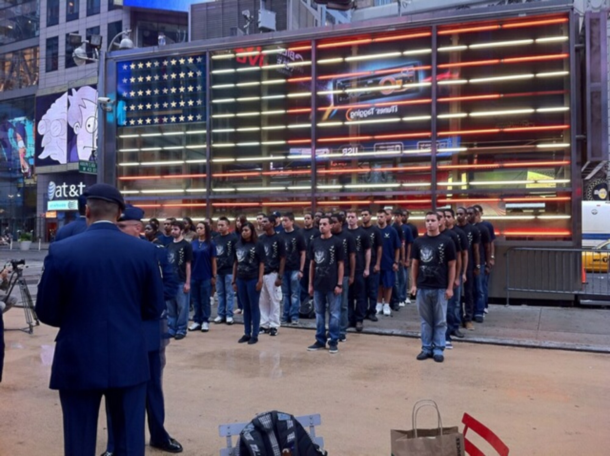 NEW YORK, N.Y. – Forty Delayed Enlistment Program members line up in Times Square here August 18 to reaffirm their commitment to enlist in the U.S. Air Force. The DEP swear-in is being covered by Defense Media Activity for Airman Magazine as part of their feature on the 10th anniversary of Sept. 11, 2001. (U.S. Air Force photo/Amy Bartholomew)