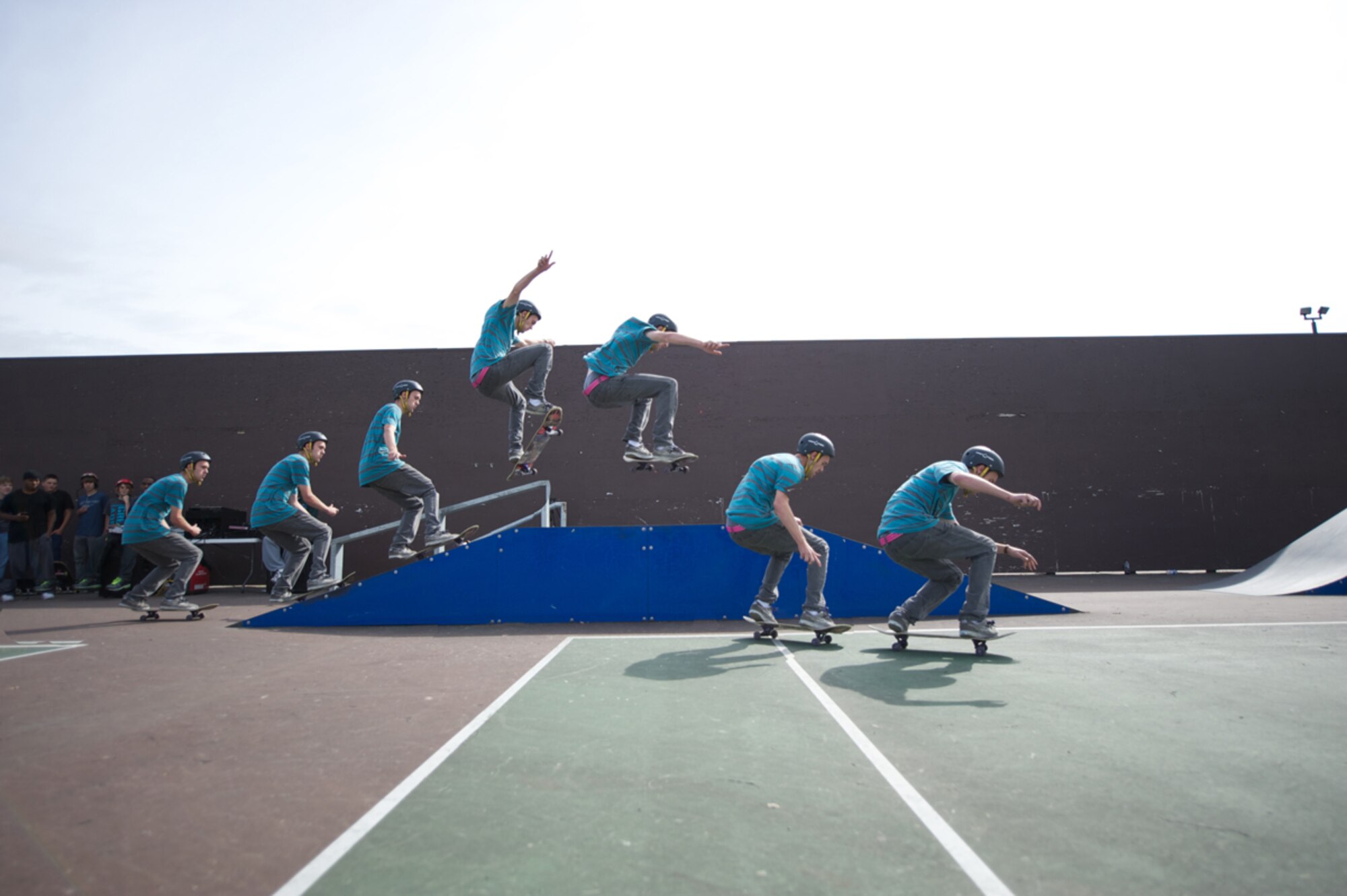 A sequence photo shows Zachary Flester of Anchorage performing an ollie off a JBER Outdoor Skate Park ramp Saturday during the installation’s Outdoor Skate Competition. (U.S. Air Force illustration/David Bedard)
