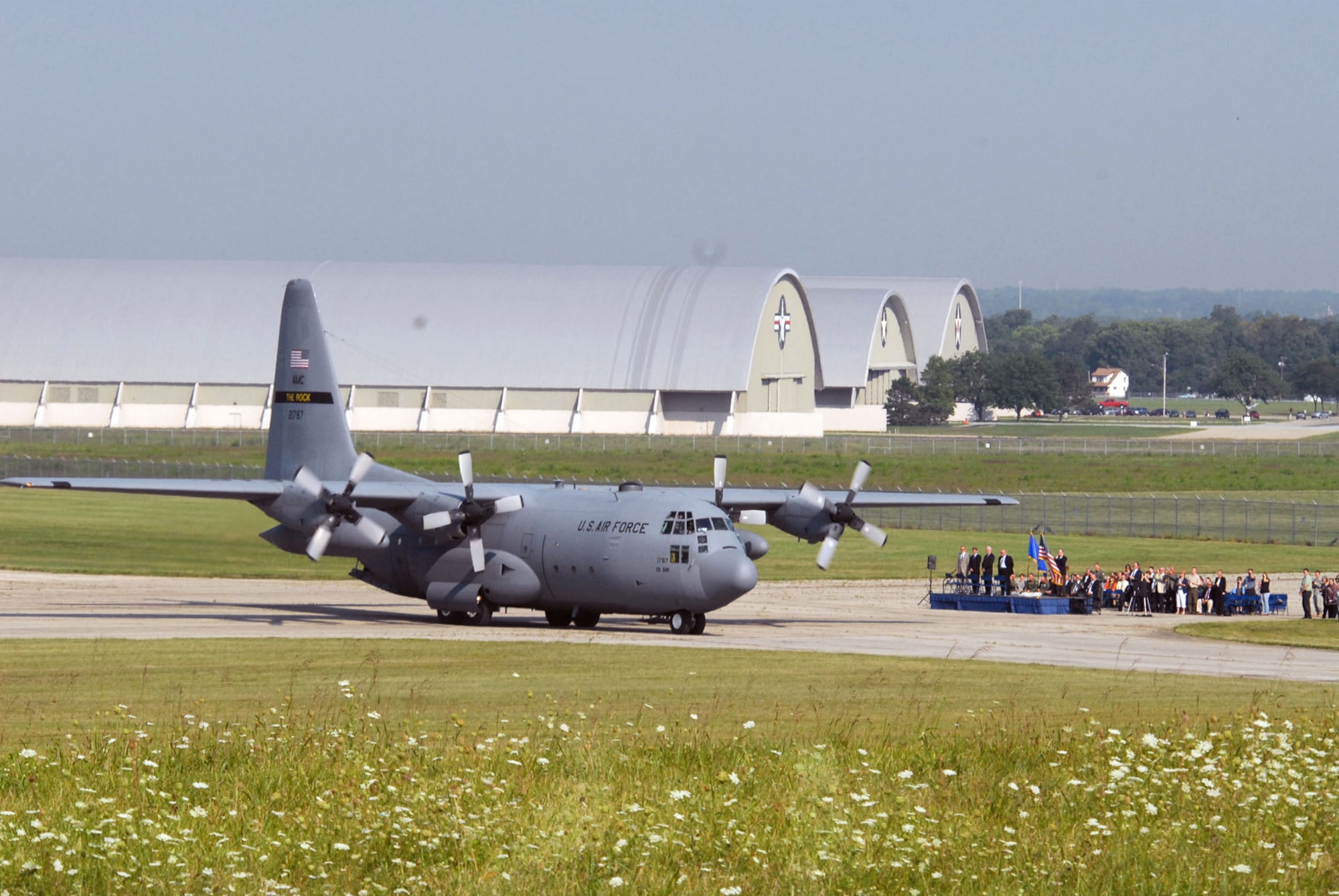 DAYTON, Ohio -- The C-130E SPARE 617 arrives at the National Museum of the U.S. Air Force after its final flight on Aug. 18, 2011. Not only is this C-130E (S/N 62-1787) representative of all C-130 transport aircraft, it also performed courageous work during the Southeast Asia War. Two members of its crew – Capt. William Caldwell, pilot, and Tech. Sgt. Charlie Shaub, loadmaster – were awarded Air Force Crosses, the U.S. Air Force’s second highest award for valor, for their heroic actions during the siege of An Loc in 1972. (U.S. Air Force photo by Jeff Fisher)