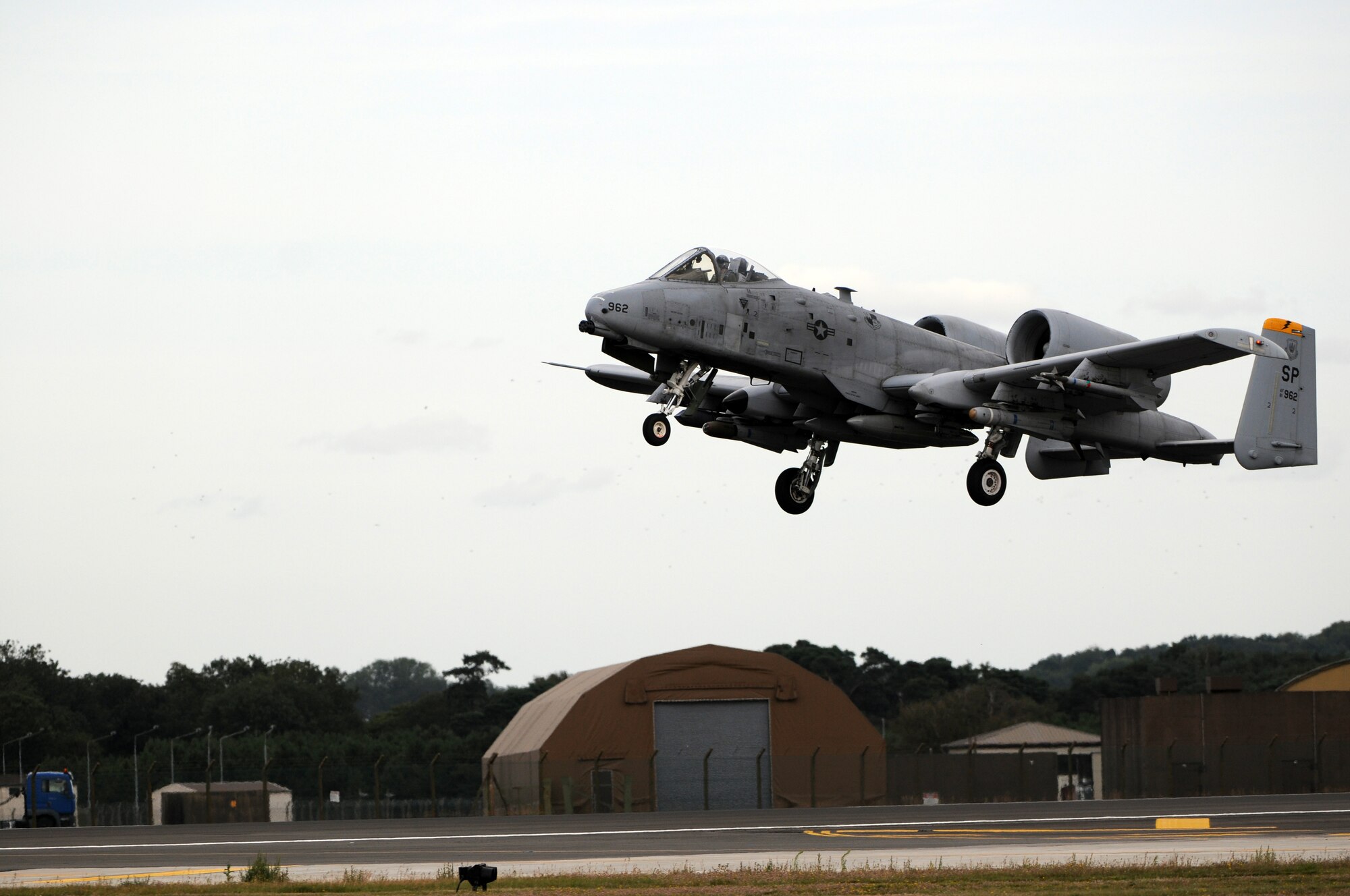 ROYAL AIR FORCE LAKENHEATH, England -- An A-10 Thunderbolt II from the 81st Fighter Squadron, Spangdahlem Air Base, Germany, takes off from RAF Lakenheath, Aug. 17, 2011. The A-10s were at Lakenheath in support of a U.K.-led exercise. The A-10 is a highly accurate weapons-delivery platform and has excellent maneuverability at low air speeds and altitude. (U.S. Air Force photo/Airman Cory D. Payne)