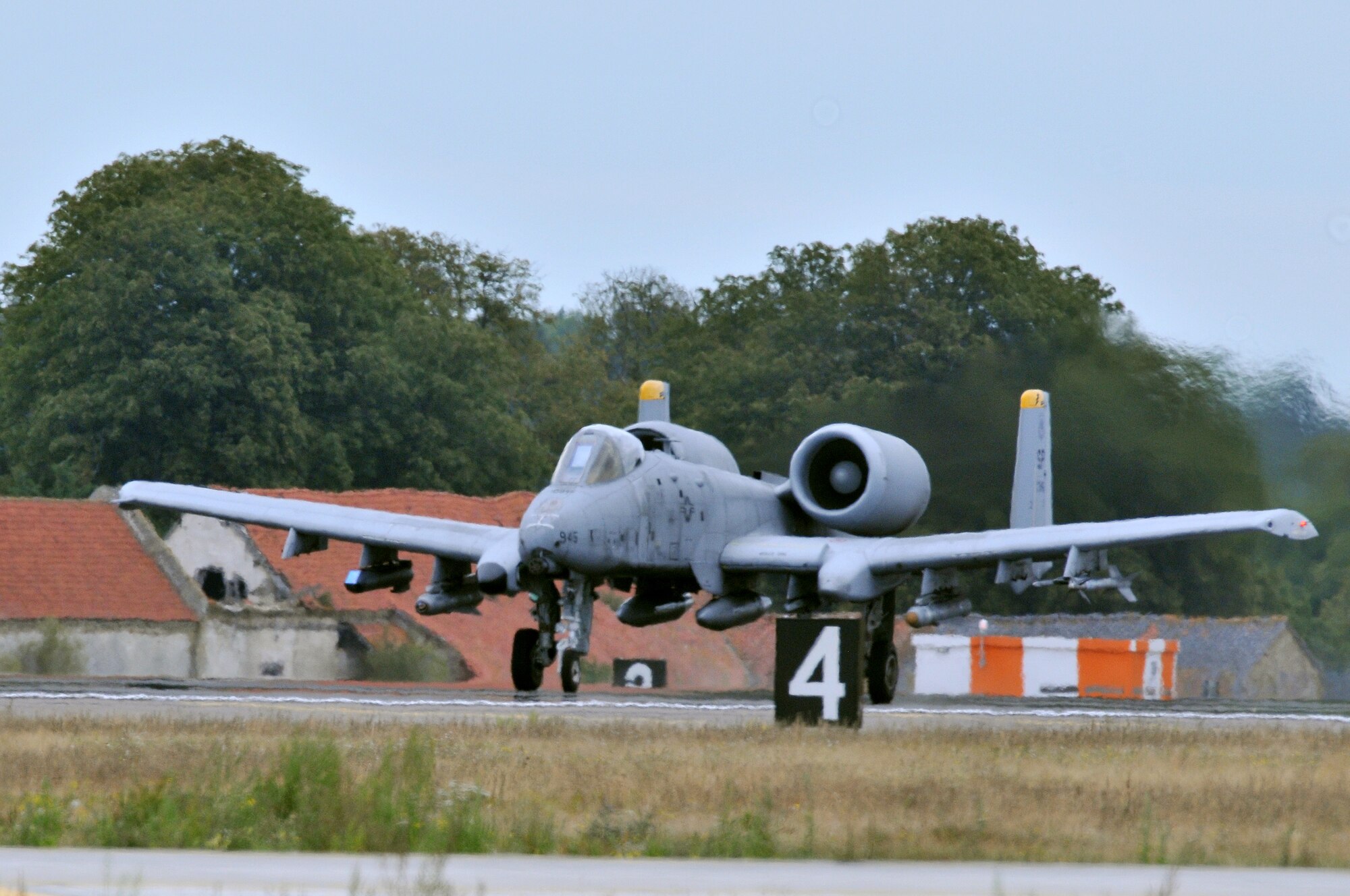 ROYAL AIR FORCE LAKENHEATH, England -- An A-10 Thunderbolt II from the 81st Fighter Squadron, Spangdahlem Air Base, Germany, prepares to take off from RAF Lakenheath, Aug. 17, 2011. The A-10s were at Lakenheath in support of a U.K.-led exercise. The A-10 is a highly accurate weapons-delivery platform and has excellent maneuverability at low air speeds and altitude. (U.S. Air Force photo/Senior Airman Lausanne Morgan) 
