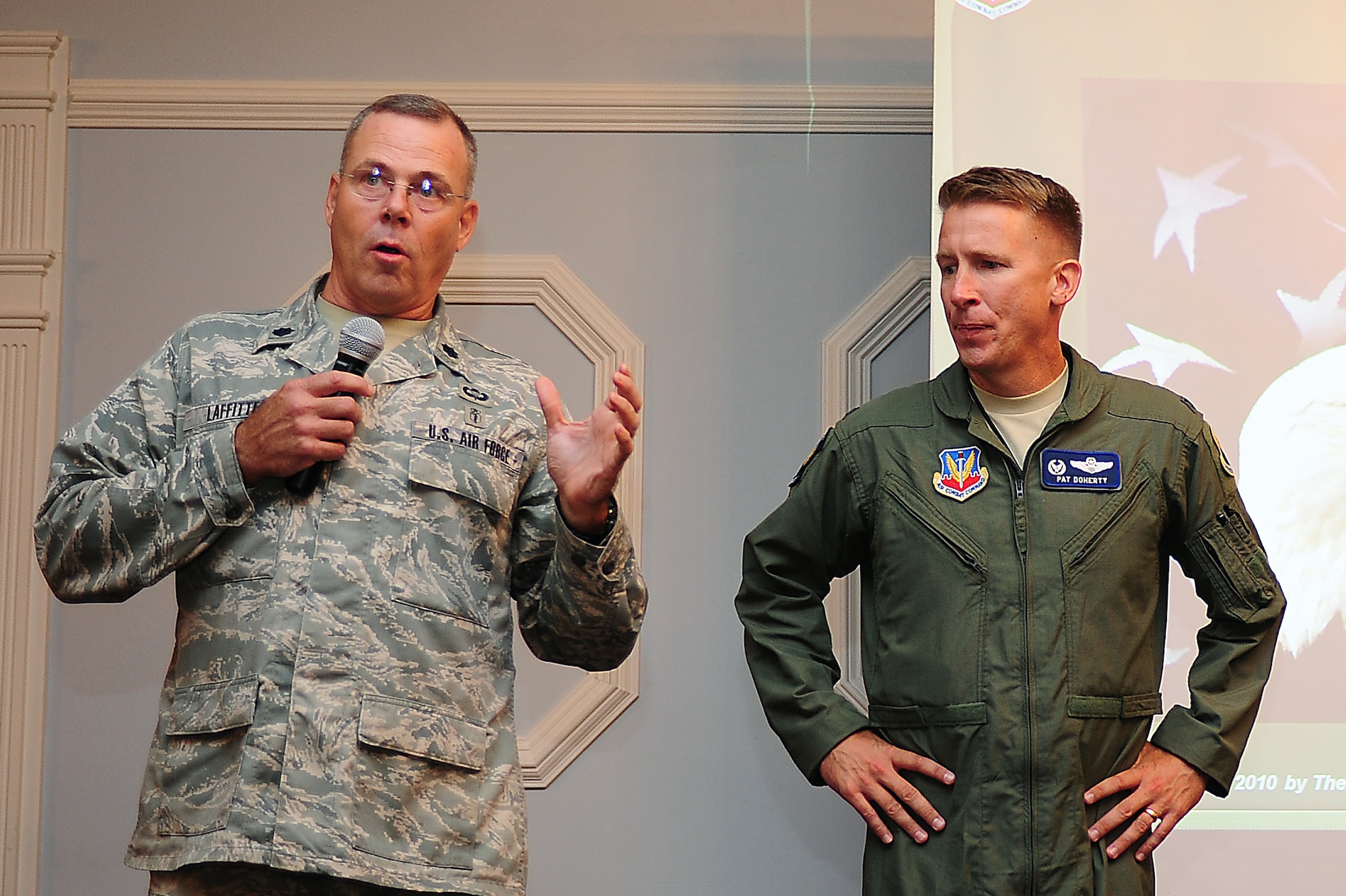 SEYMOUR JOHNSON AIR FORCE BASE, N.C. – Lt. Col. Greg Laffitte and Col. Patrick Doherty speak on the importance of resiliency in the lives of military members and their families during a resiliency training seminar here Aug. 12, 2011. Being able to bounce back and not break was one of the main themes during the training. Laffitte is a resiliency trainer from Moody Air Force Base, Ga., and Doherty is the 4th Fighter Wing commander. (U.S. Air Force photo by Senior Airman Rae Perry/ Released)