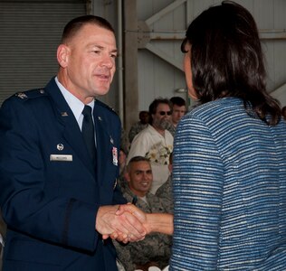 South Carolina Governor Nikki Haley shakes hands with Col. Richard McComb after the ceremonial bill signing at Joint Base Charleston Aug. 17. McComb is the Joint Base Charleston commander. (U.S. Air Force photo/Staff Sgt. Katie Gieratz)