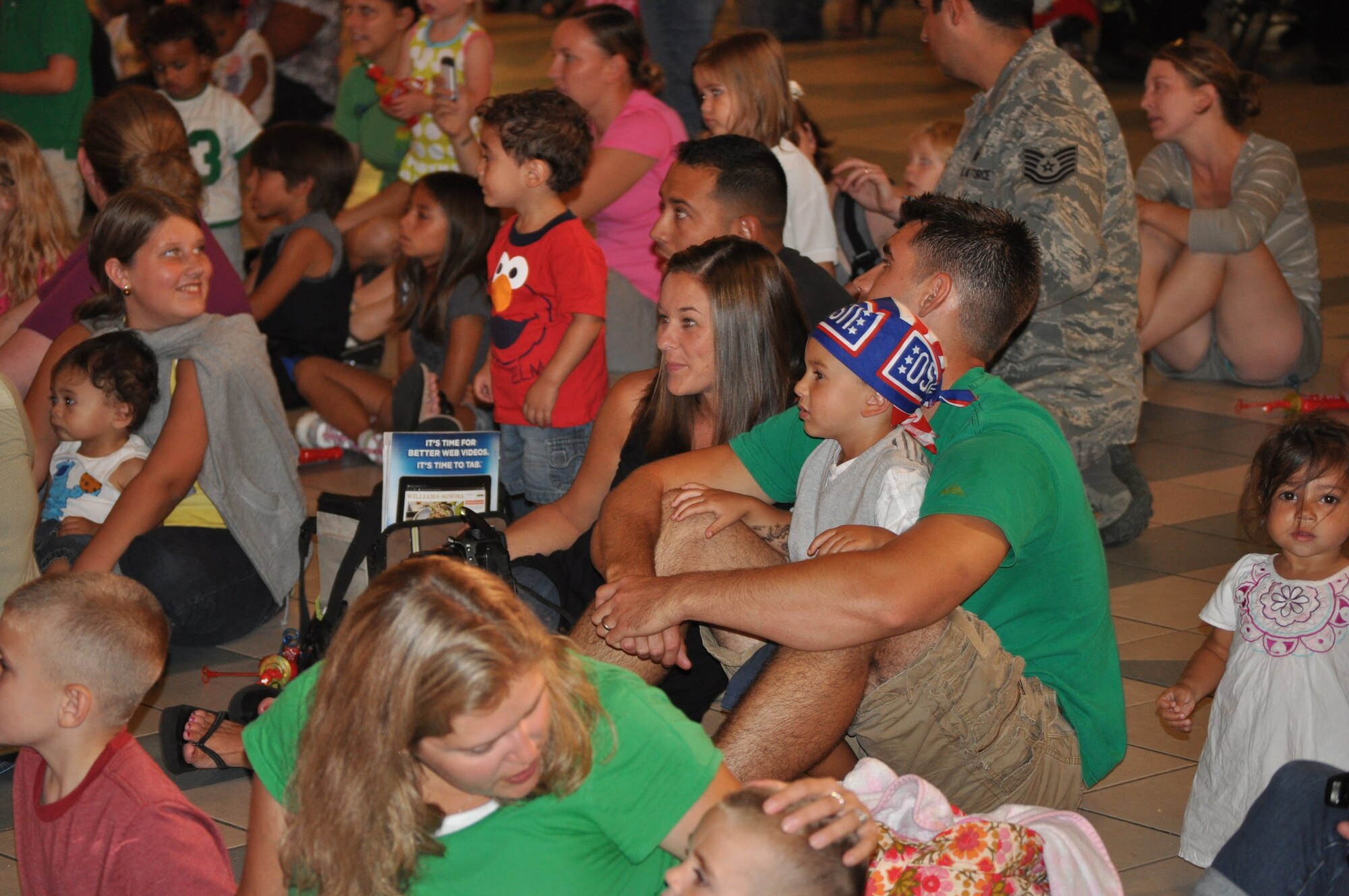 Team Aviano families enjoy a Sesame Street Muppets event hosted by the United Services Organization at the Aviano School. The Muppets put on a show geared towards helping children cope with the challenges of a parent's deployment. The tour has performed more than 372 times on 96 military bases around the world. (U.S. Air Force photo by Staff Sgt. Jason Armstrong)