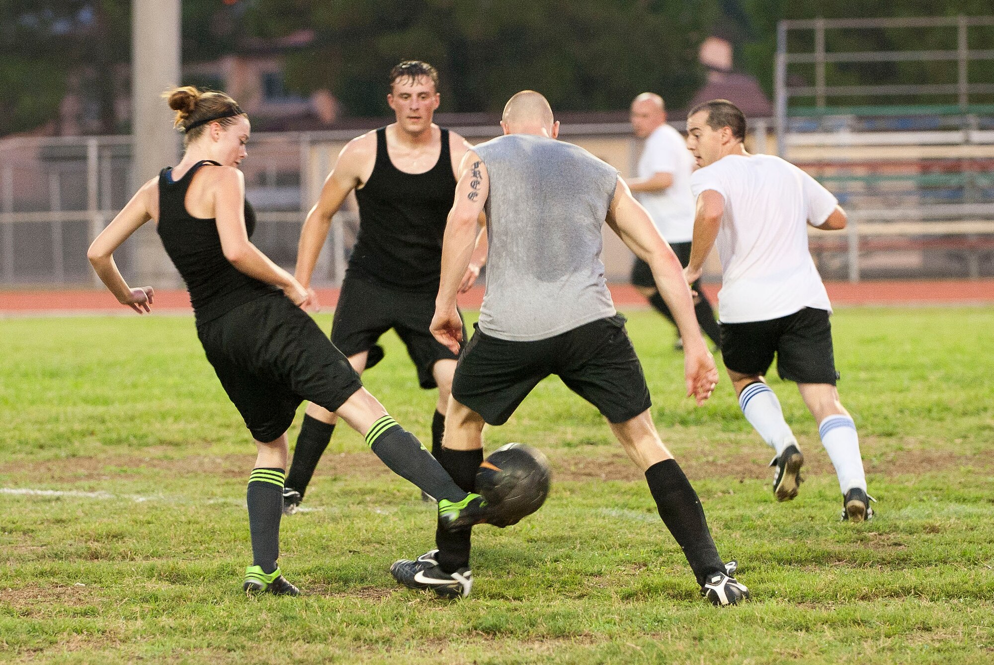 Players from the 39th Communications Squadron and 39th Maintenance Squadron face off during one of the first games of the intramural soccer season Aug. 16, 2011, at Incirlik Air Base, Turkey.  The 39th MXS won the game 1-0. The regular season is scheduled to run through late September. (U.S. Air Force photo by Airman 1st Class Clayton Lenhardt/Released)