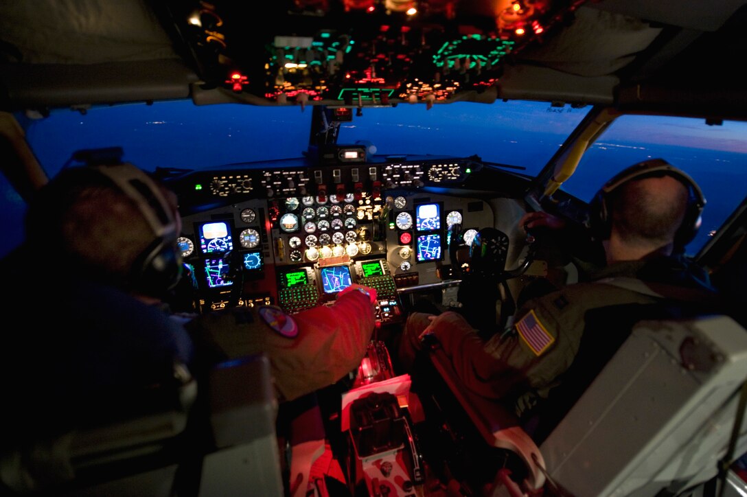 U.S. Air Force Capt. Deryck Castonguay and Capt. Matt Hendrickson fly a KC-135 Stratotranker during Green Flag West 11-9 at the National Training Center on Fort Irwin, Calif., Aug. 16, 2011. Castonguay and Hendrickson are pilots assigned to the 171st Air Refueling Squadron. Green Flag West 11-9 provides a realistic, close-air support training environment for forces preparing to support worldwide combat operations.