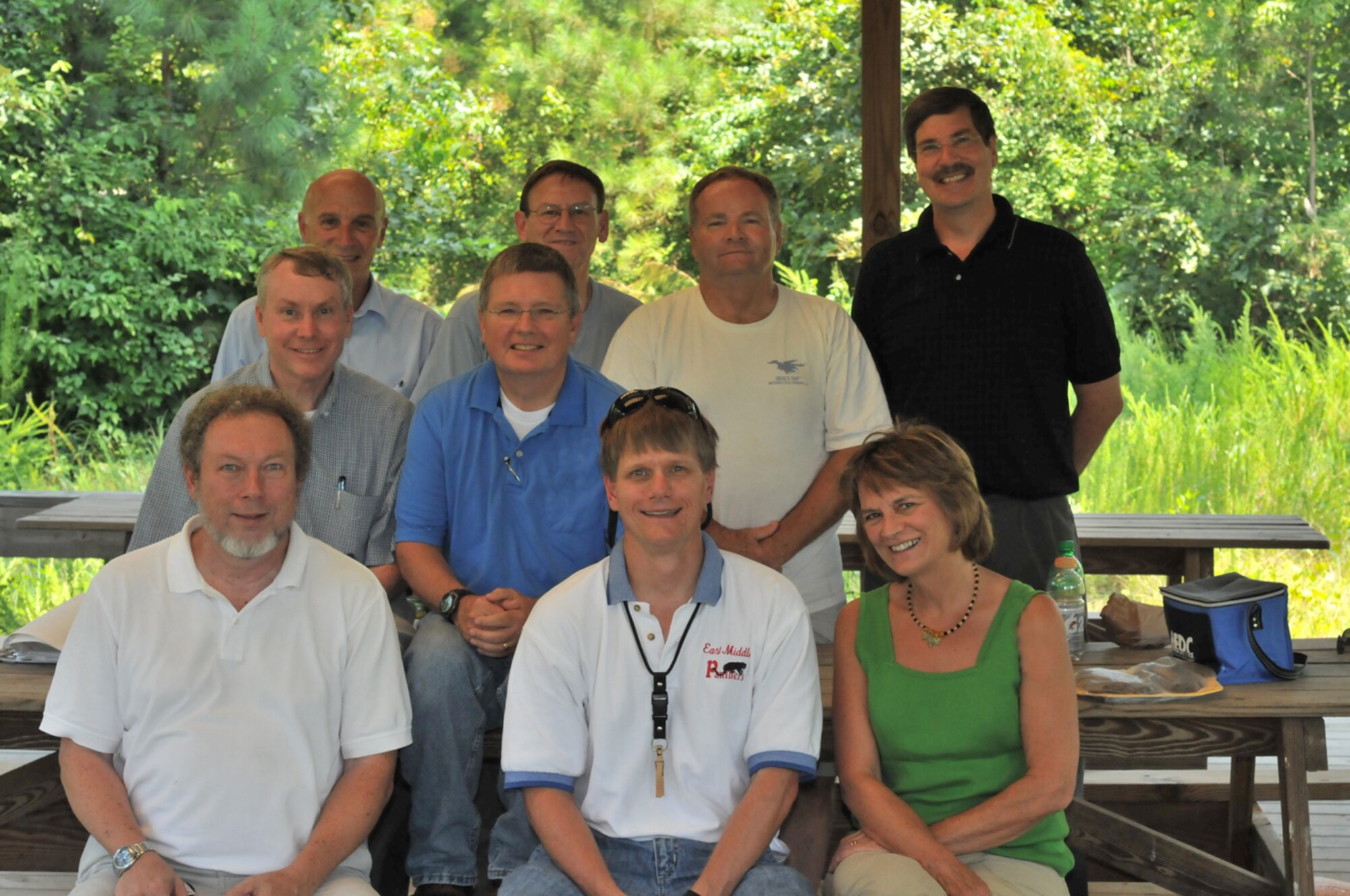 Former facilitators attending a Ropes Course reunion lunch, Aug. 3, at the pavilion near the GLC include (front row) Bob Truesdale, Terry Rayfield, Janie Casey; (second row) Larry Davis and Don Hervig; (third row) Ron Polce, Bill Peters, Jim Posey and Lance Askins. Other current AEDC employees not in attendance include Chris Broadrick, Danny Catalano, Rob McAmis and Mark Smith. (Photo provided)