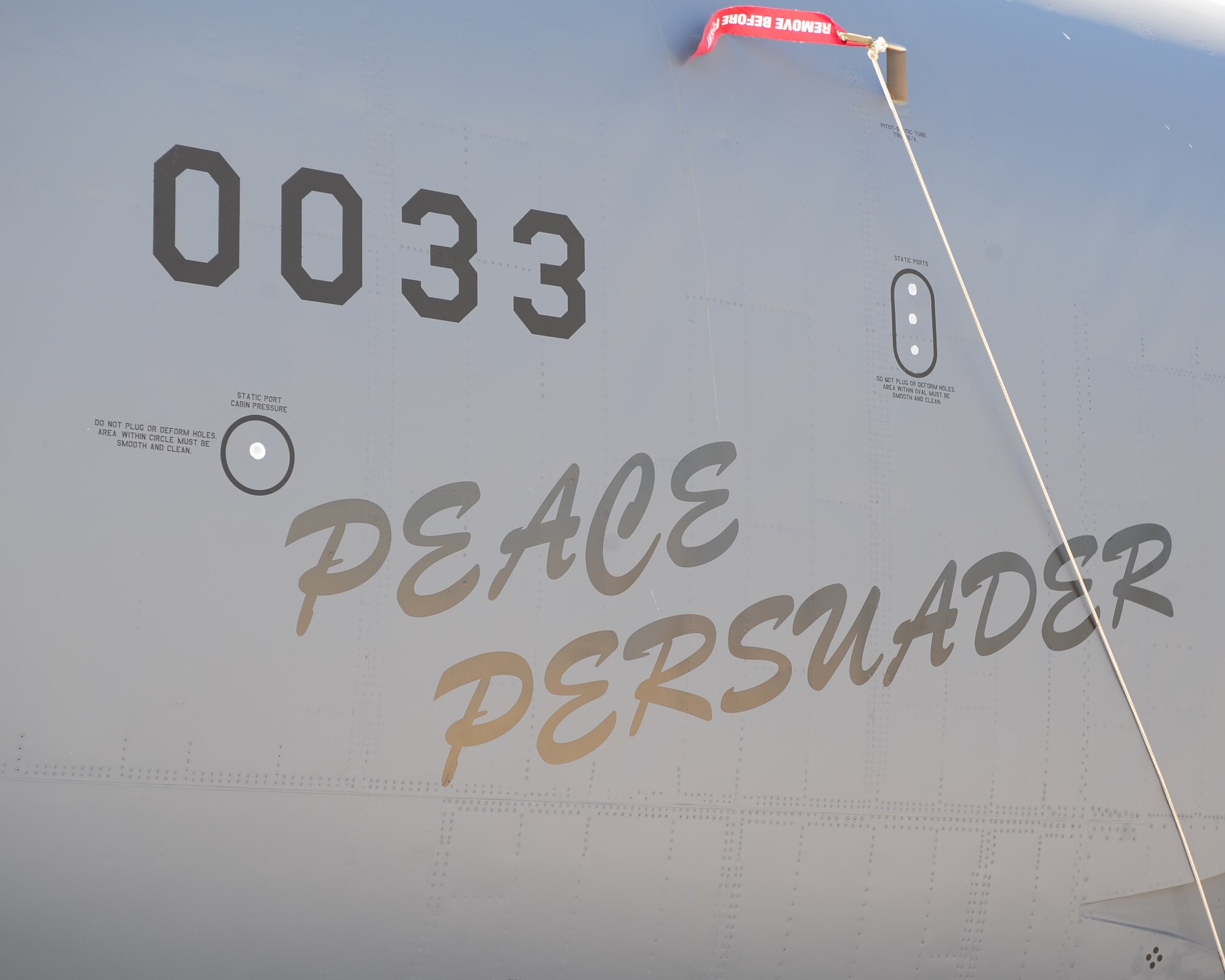 MINOT AIR FORCE BASE, N.D. -- A B-52H Stratofortess received nostalgic nose art for the 50th anniversary of its arrival to Minot AFB here Aug. 19. The name “Peace Persuader” was added for the ceremony to commemorate the airframe’s history. (U.S. Air Force photo/Senior Airman Michael J. Veloz)