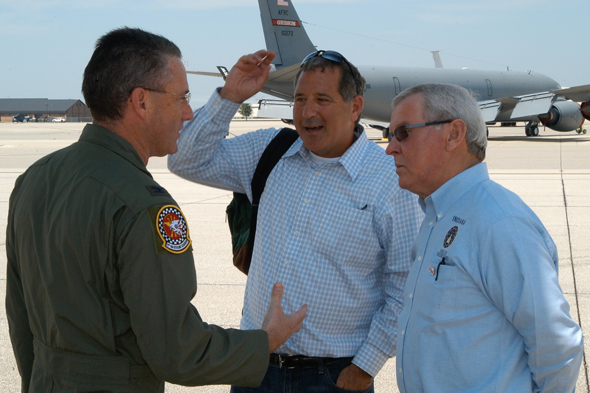 GRISSOM AIR RESERVE BASE, Ind. -- Col. Bryan Reinhart, 434th Air Refueling Wing vice commander, talks with Indiana state Rep. Bill Friend and Michael Harris, chancellor of Indiana University Kokomo, here Aug. 17. Indiana state legislators visited Grissom to learn about the base and flew aboard a KC-135R Stratotanker to observe an aerial refueling with an RC-135 in order to witness first-hand the mission of the 434th Air Refueling Wing. (U.S. Air Force photo/Senior Airman Andrew McLaughlin)                                