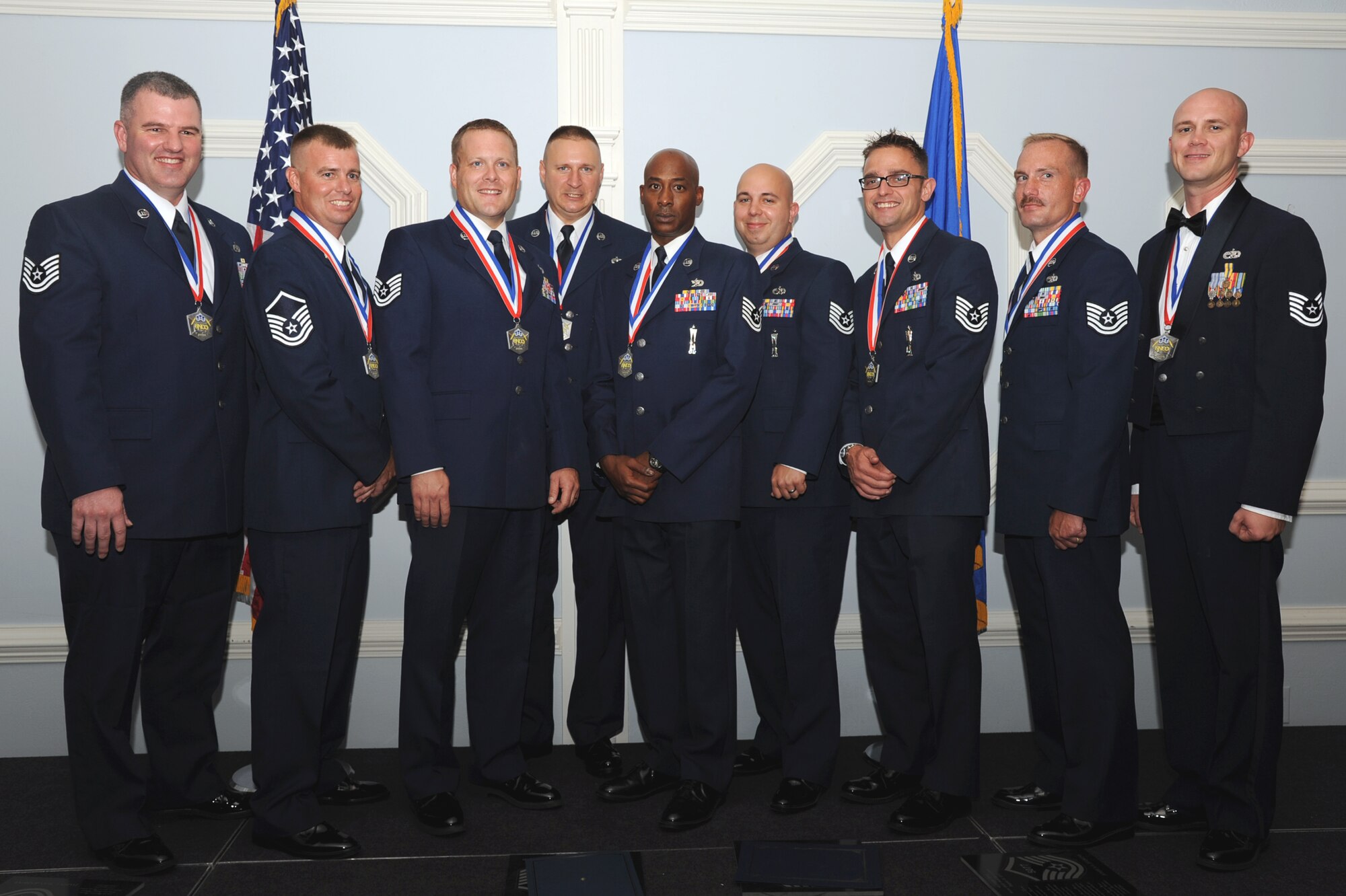 SEYMOUR JOHNSON AIR FORCE BASE, N.C.- Several senior NCOs pose for a photo after being inducted into the highest enlisted tier here, Aug. 18 2011. Integrity first, service before self and excellence in all we do are not just words, they are a lifestyle. (U.S. Air Force photo by Senior Airman Whitney Lambert/ Released) 