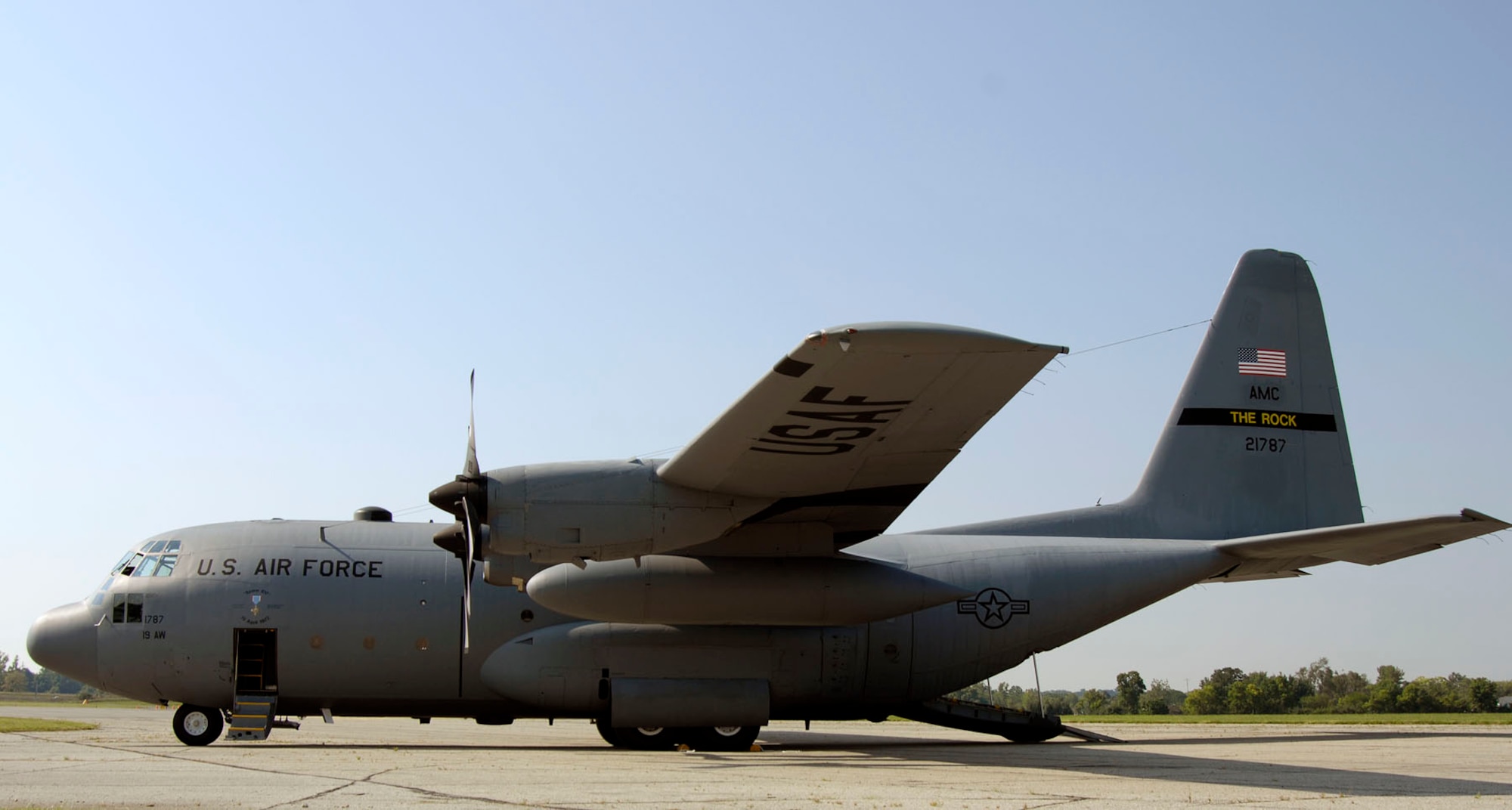 DAYTON, Ohio -- The C-130E SPARE 617 arrives at the National Museum of the U.S. Air Force after its final flight on Aug. 18, 2011. Not only is this C-130E (S/N 62-1787) representative of all C-130 transport aircraft, it also performed courageous work during the Southeast Asia War. Two members of its crew – Capt. William Caldwell, pilot, and Tech. Sgt. Charlie Shaub, loadmaster – were awarded Air Force Crosses, the U.S. Air Force’s second highest award for valor, for their heroic actions during the siege of An Loc in 1972. (U.S. Air Force photo by Michelle Gigante)