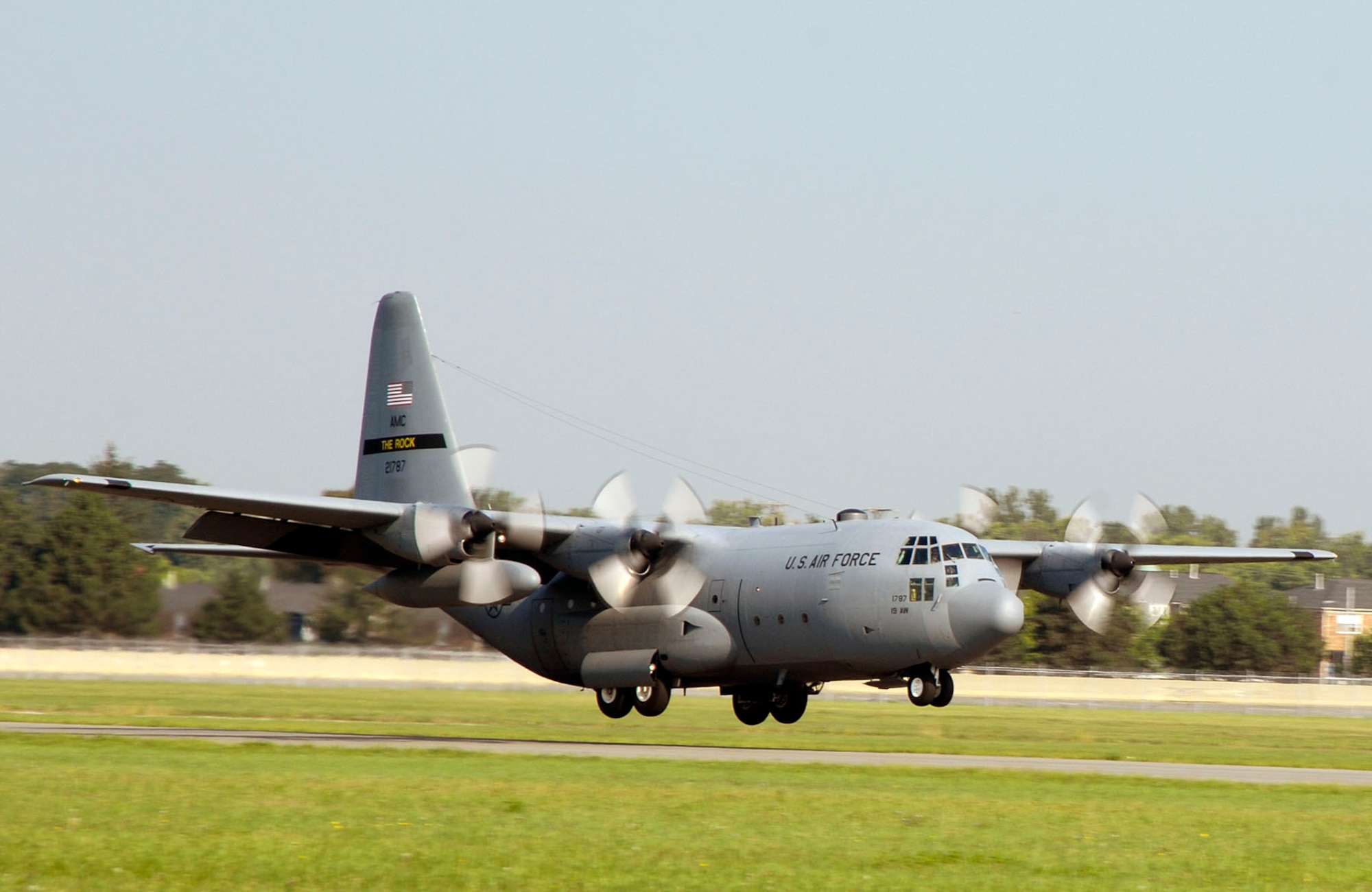 DAYTON, Ohio -- The C-130E SPARE 617 arrives at the National Museum of the U.S. Air Force after its final flight on Aug. 18, 2011. Not only is this C-130E (S/N 62-1787) representative of all C-130 transport aircraft, it also performed courageous work during the Southeast Asia War. Two members of its crew – Capt. William Caldwell, pilot, and Tech. Sgt. Charlie Shaub, loadmaster – were awarded Air Force Crosses, the U.S. Air Force’s second highest award for valor, for their heroic actions during the siege of An Loc in 1972. (U.S. Air Force photo by Michelle Gigante)