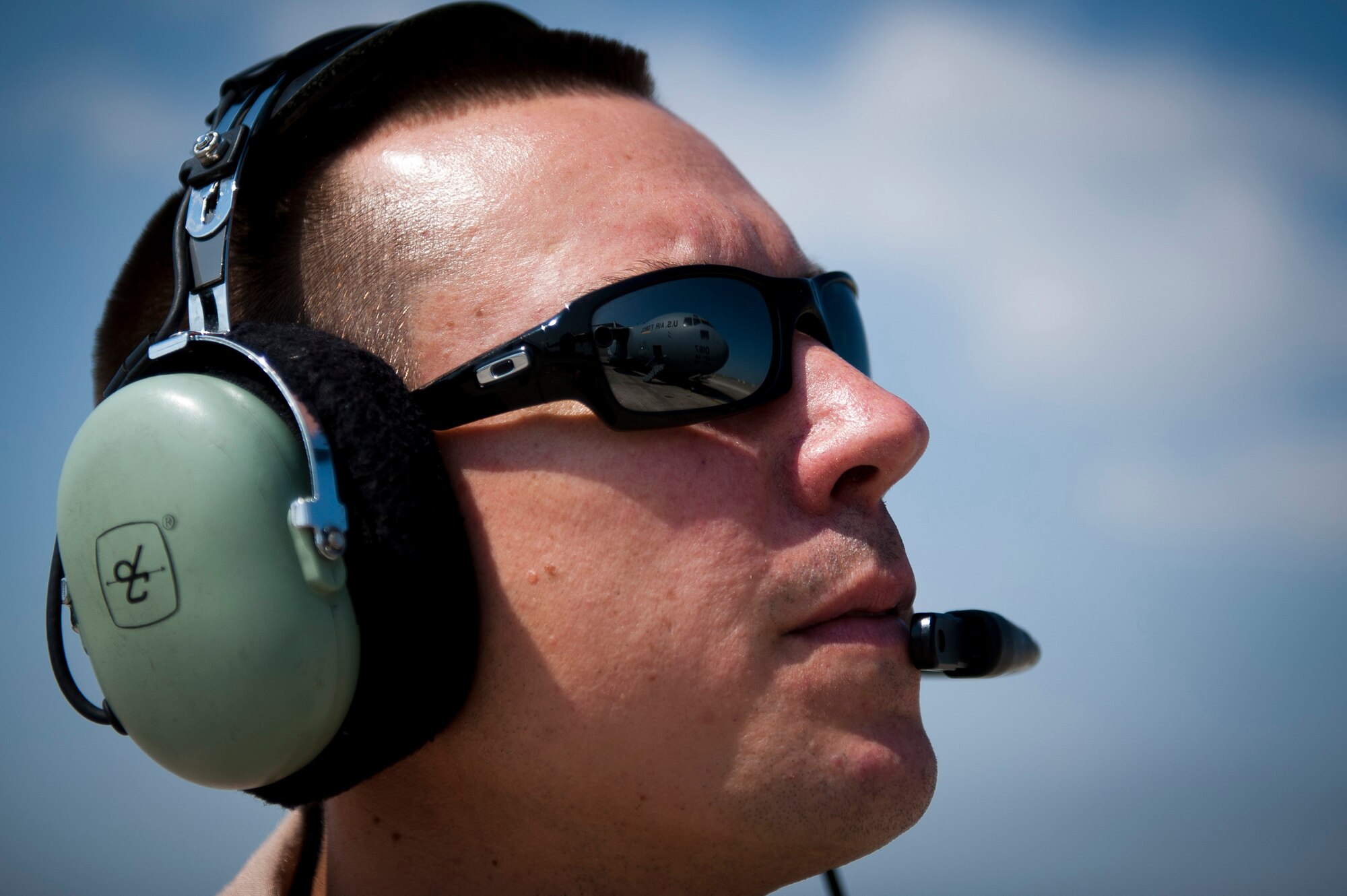 Staff Sgt. Sean Sullivan, an 817th Expeditionary Airlift Squadron loadmaster, monitors C-17 Globemaster III aircraft engines during startup Aug. 18, 2011, at Incirlik Air Base, Turkey, prior to a mission to transport equipment and supplies to Kandahar Air Field, Afghanistan. Loadmasters ensure the cargo is properly secured in addition to observing engines before takeoff. (U.S. Air Force photo by Tech. Sgt. Michael B. Keller/Released)