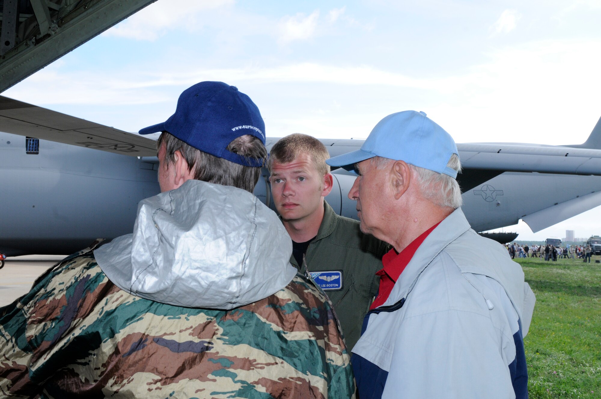 ZHUKOVSKY AIR FIELD, Russia – Staff Sgt. Lee Boston, 37th Airlift Squadron loadmaster from Ramstein Air Base, Germany, explains how many paratroopers a C-130 can carry to a visitor to the Moscow International Aviation and Space Salon, or MAKS 2011, here Aug. 19. MAKS is one of the premier events of its type in the world and Department of Defense participation demonstrates the United States commitment to international security, promotes international cooperation, and contributes to U.S. foreign policy objectives.  The U.S. Air Force has a KC-10 Extender, two F-16C Fighting Falcons, two A-10 Thunderbolt II, one F-15E Strike Eagle, one B-52 Stratotanker, C-130J Super Hercules and C-5M Galaxy statics for the show. (U.S. Air Force photo/Master Sgt. Kelley J. Stewart)
