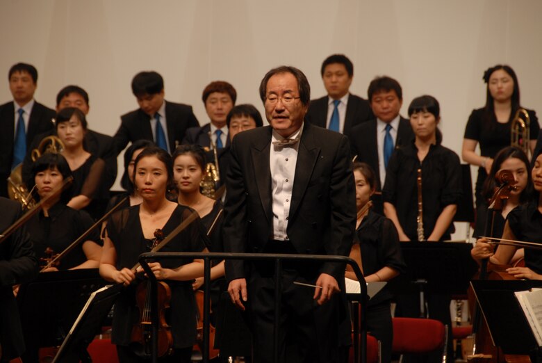 KUNSAN AIR BASE, Republic of Korea -- The conductor and members of the Gunsan City Orchestra received an ovation for their performance here Aug. 18. Free tickets were provided to active duty Airmen and their families. (U.S. Air Force photo/1st Lt. Trisha Eldredge)