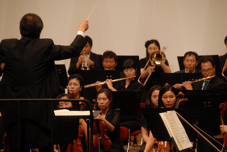 KUNSAN AIR BASE, Republic of Korea -- The Gunsan City Orchestra performs during the Summer Classic Concert here Aug. 18. Free tickets were provided to active duty Airmen and their families. (U.S. Air Force photo/1st Lt. Trisha Eldredge)