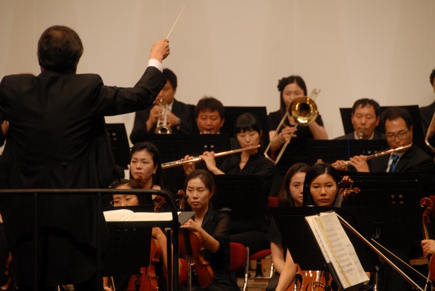 KUNSAN AIR BASE, Republic of Korea -- The Gunsan City Orchestra performs during the Summer Classic Concert here Aug. 18. Free tickets were provided to active duty Airmen and their families. (U.S. Air Force photo/1st Lt. Trisha Eldredge)