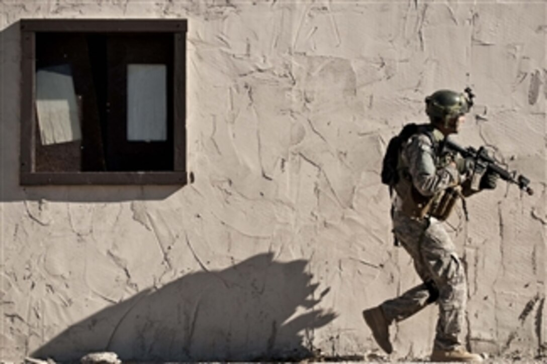U.S. Air Force Airman 1st Class Michael Pincheira, a joint tactical air controller with the 5th Air Support Operations Squadron, provides security during a training exercise in the National Training Center at Fort Irwin, Calif., on Aug. 14, 2011.  Joint tactical air controller airmen trained with the 12th Combat Training Squadron as part of Green Flag-West to prepare for upcoming deployments.  