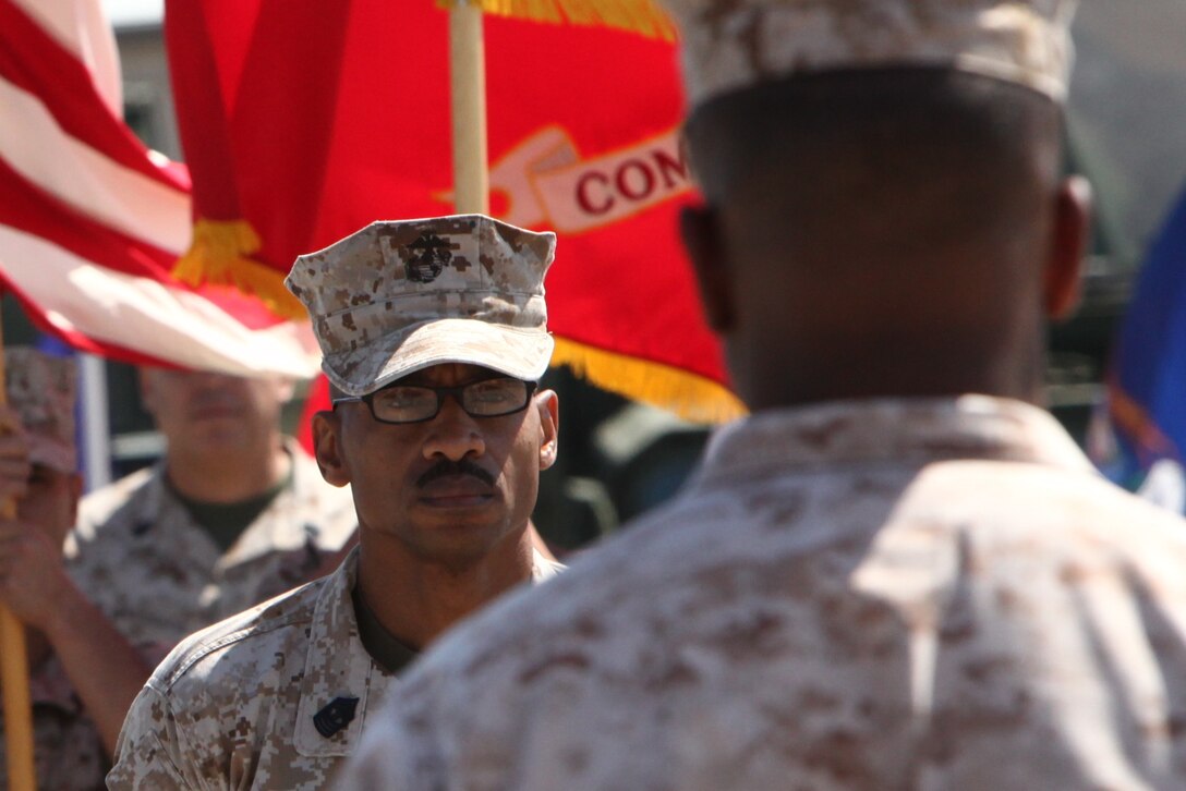 Master Gunnery Sgt. Charles E. Vinson, chief supply administration, G-4, Headquarters Company, Combat Logistics Regiment 17, 1st Marine Logistics Group, stands at attention during his retirement ceremony aboard Camp Pendleton, Calif., Aug. 19. Vinson, from Montgomery, Al., retired after serving 30 years of faithful service to the Marine Corps.