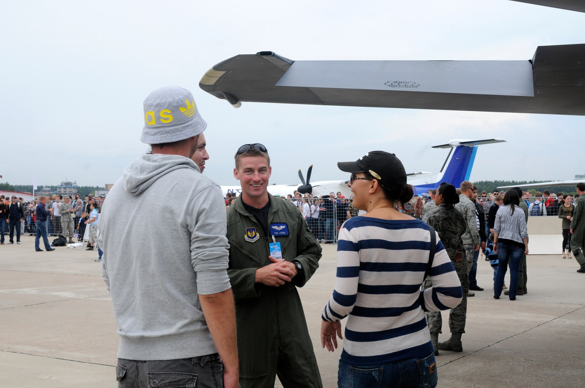 ZHUKOVSKY AIR FIELD, Russia – Capt. Tom Larner, 492nd Fighter Squadron weapons system officer from Royal Air Force Lakenheath, gives a tour of his F-15E Strike Eagle to some visitors to the Moscow International Aviation and Space Salon, or MAKS 2011, here Aug. 20. MAKS is one of the premier events of its type in the world and Department of Defense participation demonstrates the United States commitment to international security, promotes international cooperation, and contributes to U.S. foreign policy objectives.  The U.S. Air Force has a KC-10 Extender, two F-16C Fighting Falcons, two A-10 Thunderbolt II, one F-15E Strike Eagle, one B-52 Stratotanker, C-130J Super Hercules, C-5M Galaxy, and a U.S. Navy P-3 Orion statics for the show. (U.S. Air Force photo/Master Sgt. Kelley J. Stewart)