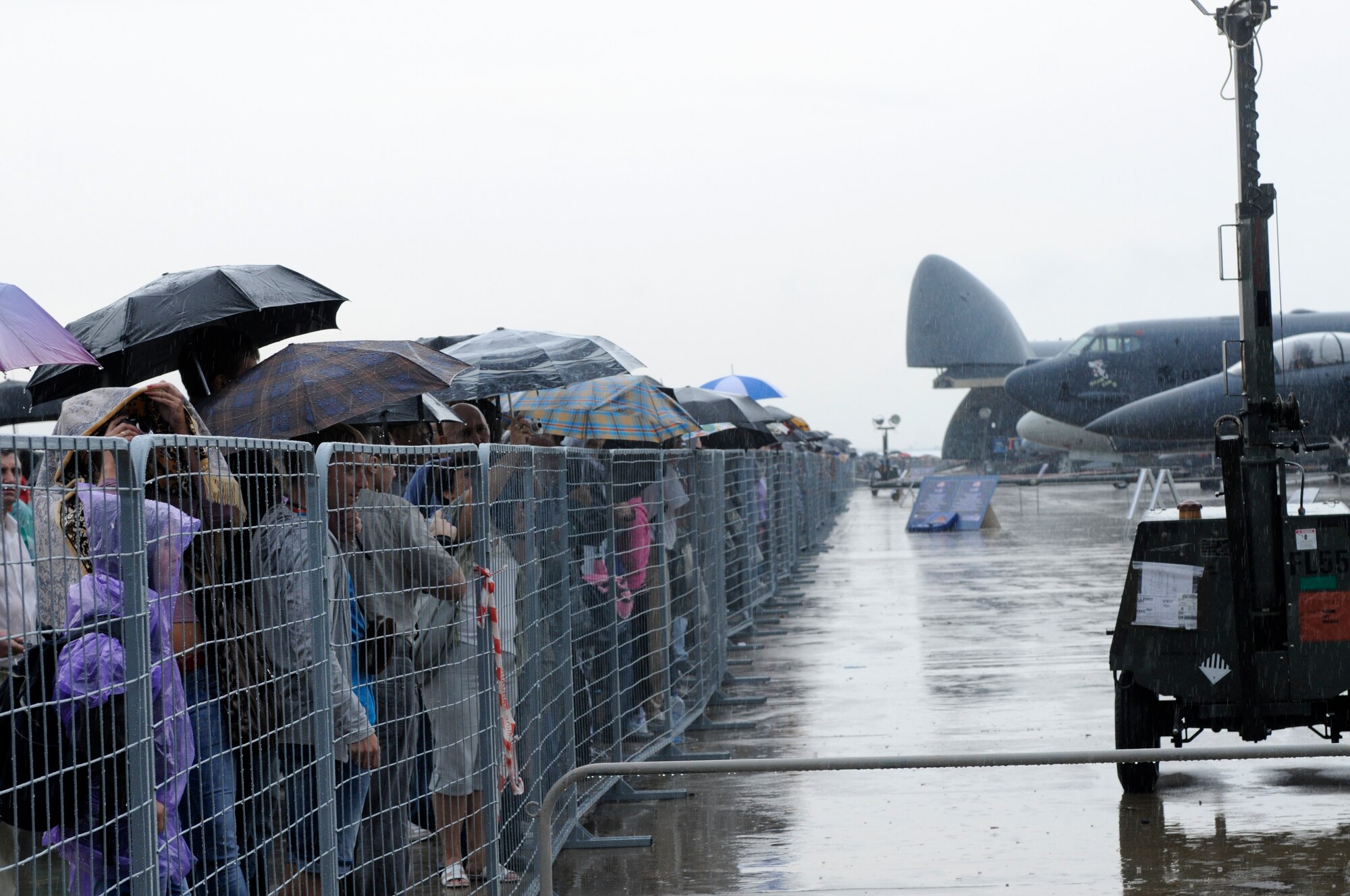 ZHUKOVSKY AIR FIELD, Russia – Russian crowds brave the rain to visit American military aircraft at the Moscow International Aviation and Space Salon, or MAKS 2011, here Aug. 20. MAKS is one of the premier events of its type in the world and Department of Defense participation demonstrates the United States commitment to international security, promotes international cooperation, and contributes to U.S. foreign policy objectives.  The U.S. Air Force has a KC-10 Extender, two F-16C Fighting Falcons, two A-10 Thunderbolt II, one F-15E Strike Eagle, one B-52 Stratotanker, C-130J Super Hercules, C-5M Galaxy, and a U.S. Navy P-3 Orion statics for the show. (U.S. Air Force photo/Master Sgt. Kelley J. Stewart)