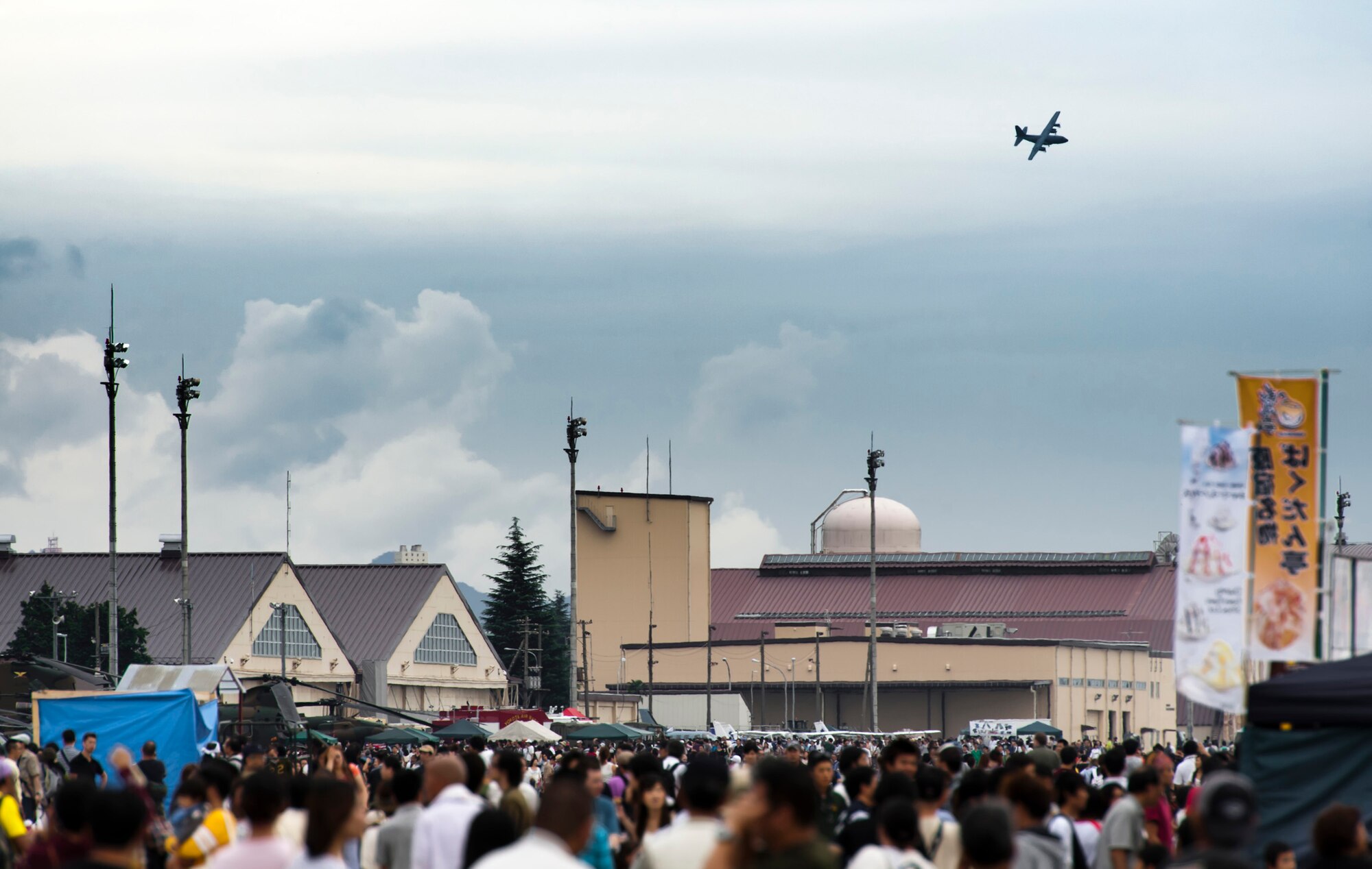 YOKOTA AIR BASE, Japan -- A C-130 Hercules circles around for a low pass over the active runway Aug. 20, 2011, during an aerial demonstration at the Japanese-American Friendship Festival held at Yokota Air Base, Japan. (U.S. Air Force photo/Staff Sgt. Samuel Morse)