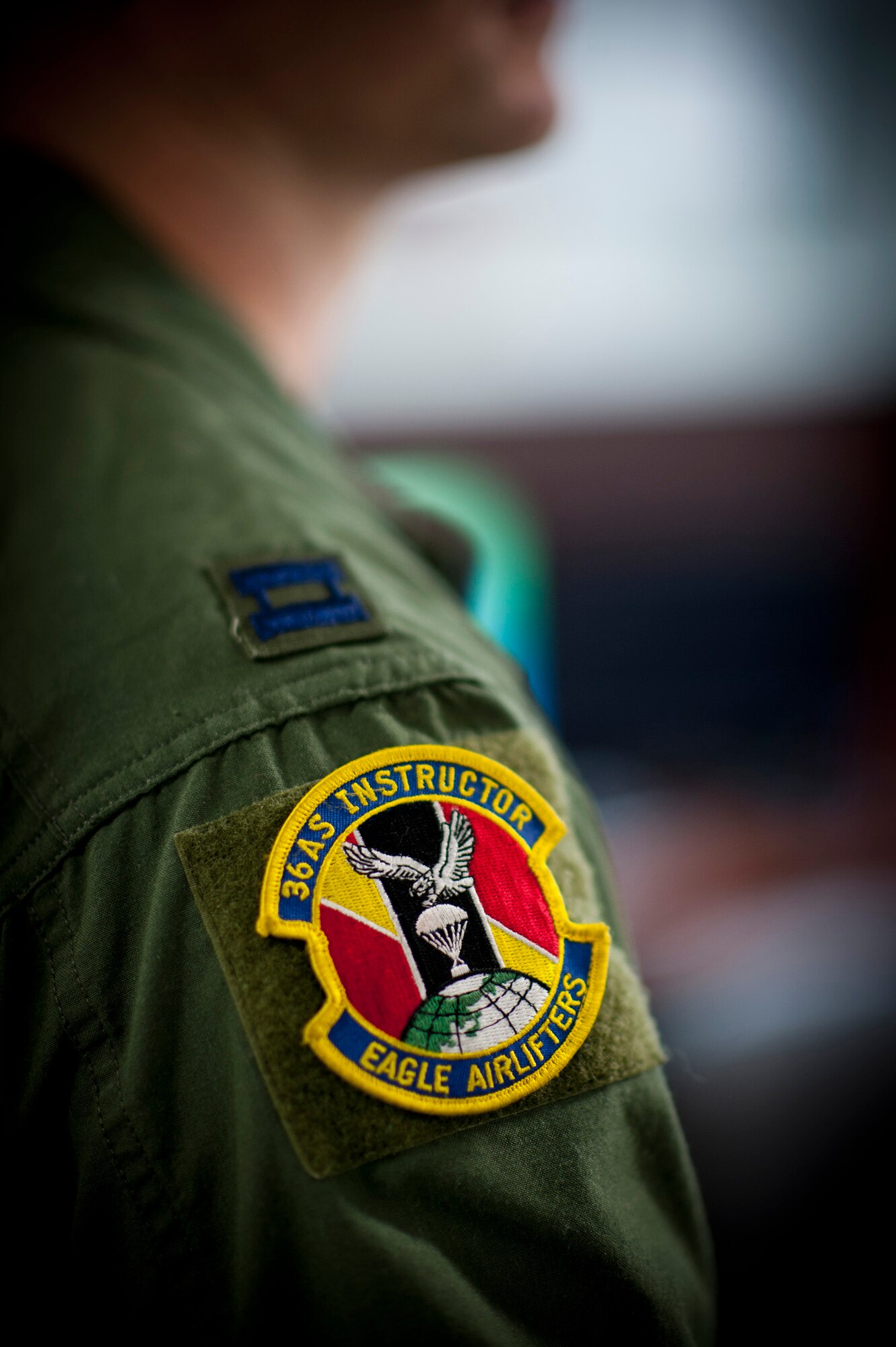 YOKOTA AIR BASE, Japan -- A 36th Airlift Squadron instructor patch sits promenently on the shoulder of Capt. Chris Tidwell Aug. 20, 2011, during the Japanese-American Friendship Festival at Yokota Air Base, Japan. (U.S. Air Force photo/Staff Sgt. Samuel Morse)