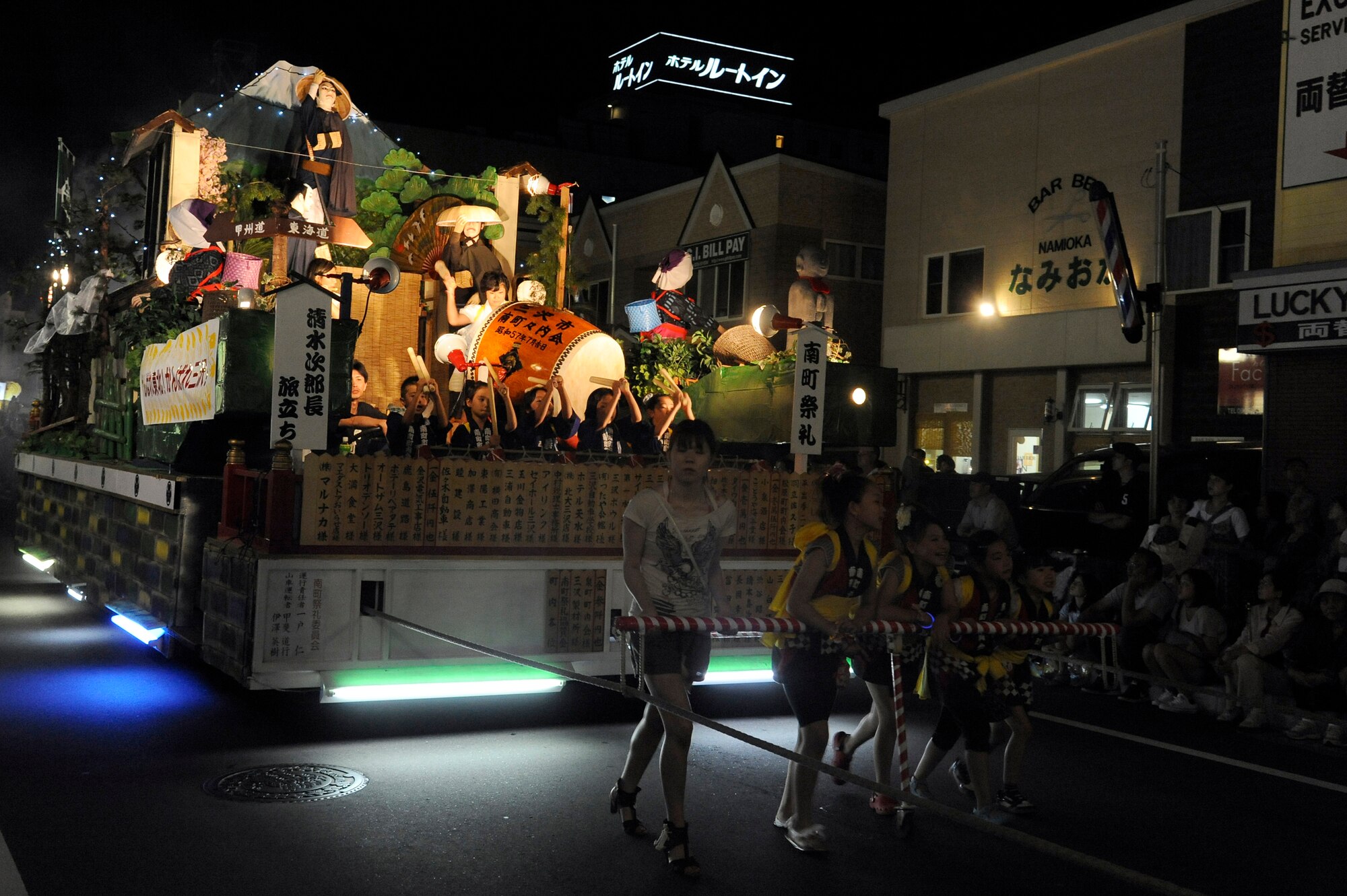 MISAWA CITY, Japan -- Residents of Misawa City pull an elaborately decorated float in a parade during the Misawa Summer Festival Aug. 19. Members of Misawa Air Base along with members of the local community enjoyed float parades and Japanese food during the three-day festival. (U.S. Air Force photo/Tech. Sgt. Marie Brown)