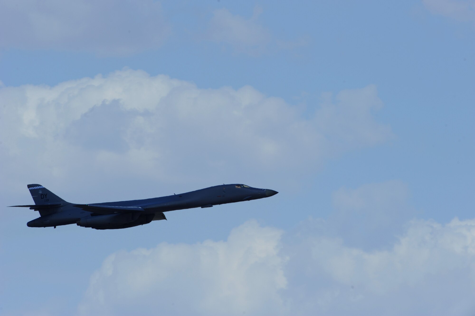 A B-1 Bomber from the 77th Weapons Squadron flies solo Aug. 18, 2011 after separating from formation at Dyess Air Force Base, Texas. The formation was performed by students and instructors from the 77th Weapons School to develop new tactics for battle situations. (U.S. Air Force photo by Airman 1st Class Jonathan Stefanko/ Released)