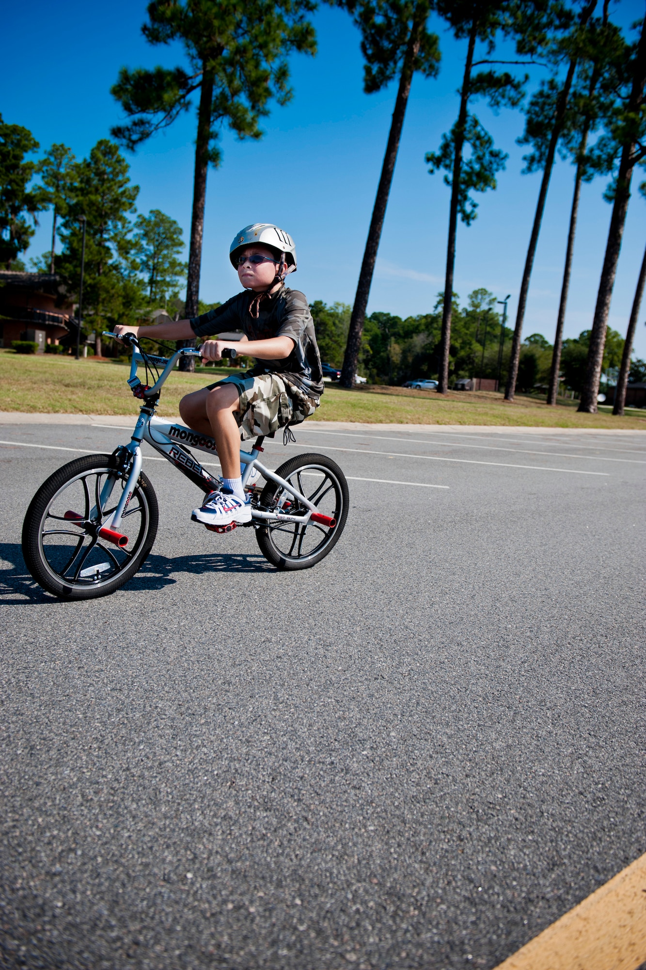 Robert, son of U.S. Air Force Tech. Sgt. Richard Pratt, 23rd Logistics Readiness Squadron, makes his way to the bicycle finishing point during the Kids Triathlon at Moody Air Force Base, Ga., Aug. 20, 2011. The kids rode their bicycles for six miles before entering the final event. (U.S. Air Force photo by Staff Sgt. Jamal D. Sutter/Released)