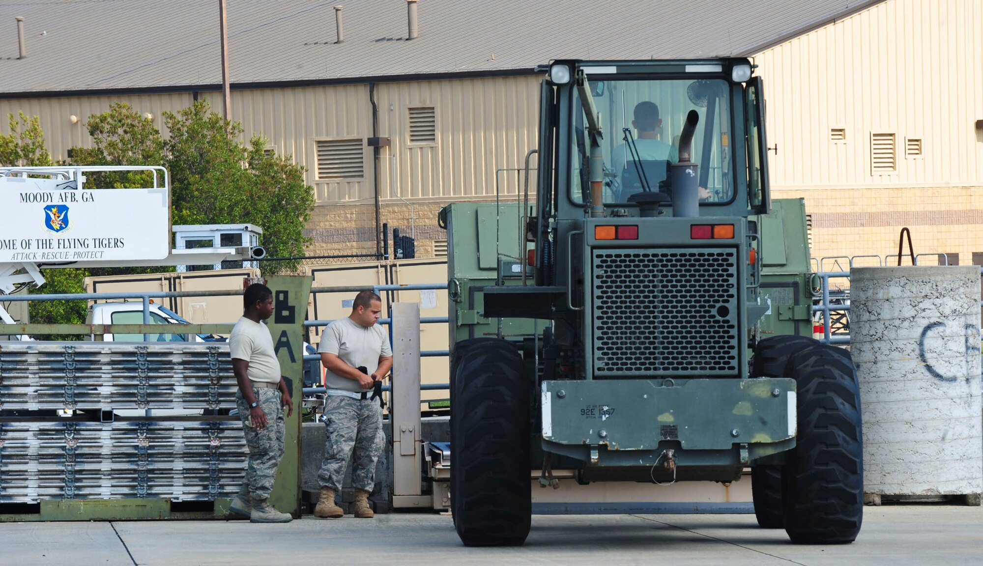 U.S. Air Force Staff Sgts. David Garman and Jeremy Johnson, 23rd Logistics Readiness Squadron air transportation craftsman, checks the weight of the cargo at Moody Air Force Base, Ga., Aug. 18, 2011. The total weight of all the cargo being sent to Nellis Air Force Base, Nev., for Green Flag exercise is 8,130 pounds. (U.S. Air Force photo by Senior Airman Stephanie Mancha/Released)