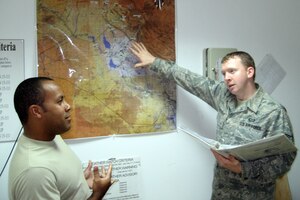 Senior Airman Daniel McGonigle is deployed from the 1st Operations Support Squadron to the 332nd Air Expeditionary Wing at Joint Base Balad, Iraq, where he serves as a weather forecaster. SrA McGonigle is responsible for producing weather observations to determine whether pilots can take off or land, as well as coordinating with weather forecasters back in the U.S. to determine expected flight and resource protection impacts for the next 24 hours. (Courtesy photo)