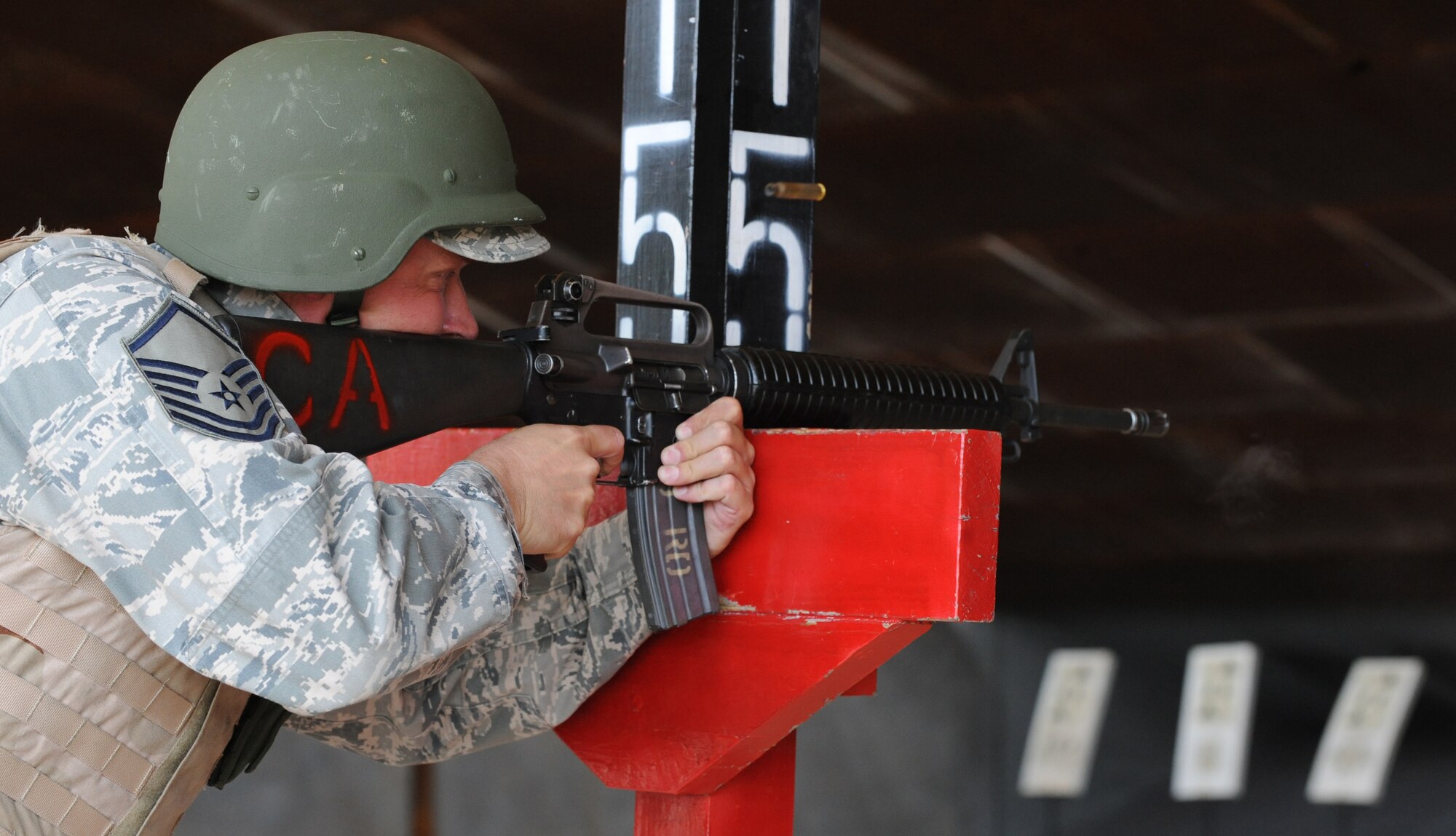 An Airman at the Combat Arms Training and Maintenance range fires an M-16A2 rifle on Barksdale Air Force Base, La., Aug. 18. The M-16A2 rifle's maximum affective range for an area target is slightly less than half of a mile or 800 meters. (U.S. Air Force photo/Airman 1st Class Micaiah Anthony)(RELEASED)
 
