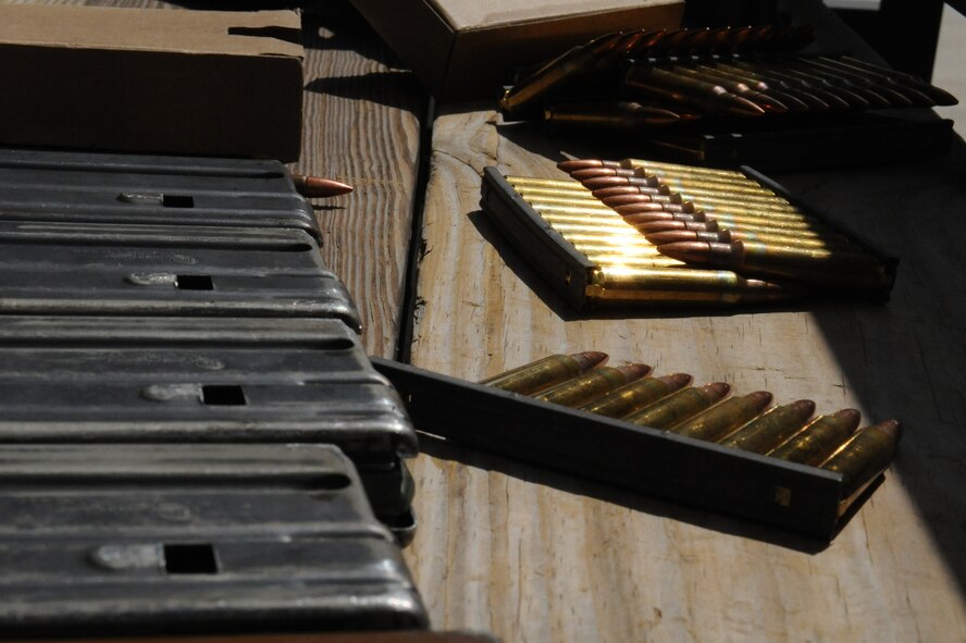 Ammunition and magazines for an M-16A2 lay on a bench at the Combat Arms Training and Maintenance range on Barksdale Air Force Base, La., Aug 18. In 1970, NATO attempted to standardize a common rifle and secondary rifle caliber to allow member nations to share rifle ammunition and magazines during military operations. As of 2009, there are five NATO nominated weapons that use the 5.56 ammunition design; the M-16A2 is one of the five. (U.S. Air Force photo/Airman 1st Class Micaiah Anthony)(RELEASED) 
