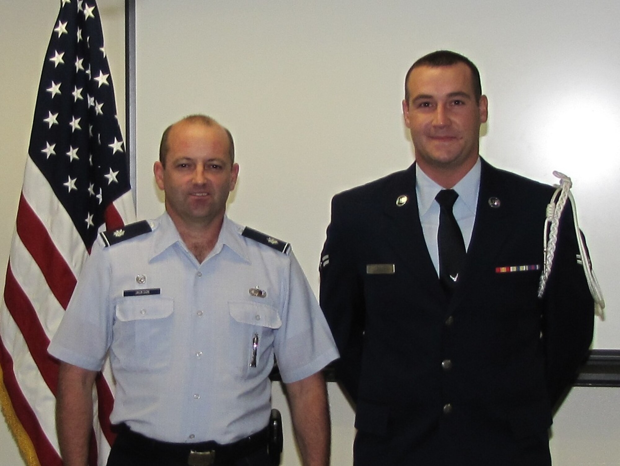 365th Training Squadron graduate Airman 1st Class James Dover completed the Instrument and Flight Controls Apprentice Course with a score of 100 percent, earning the Ace Award, at Sheppard Air Force Base, Texas, Aug. 22. The course consists of 12 blocks of instruction and is 60 academic days in length. 365th Training Squadron Commander Lt. Col. Eric Jackson presented the award at the graduation ceremony. Airman Dover will become a member of the 19th Aircraft Maintenance Squadron, Little Rock AFB, and will be maintaining the instrument and flight control systems of C-130 aircraft. (U.S. Air Force courtesy photo)
