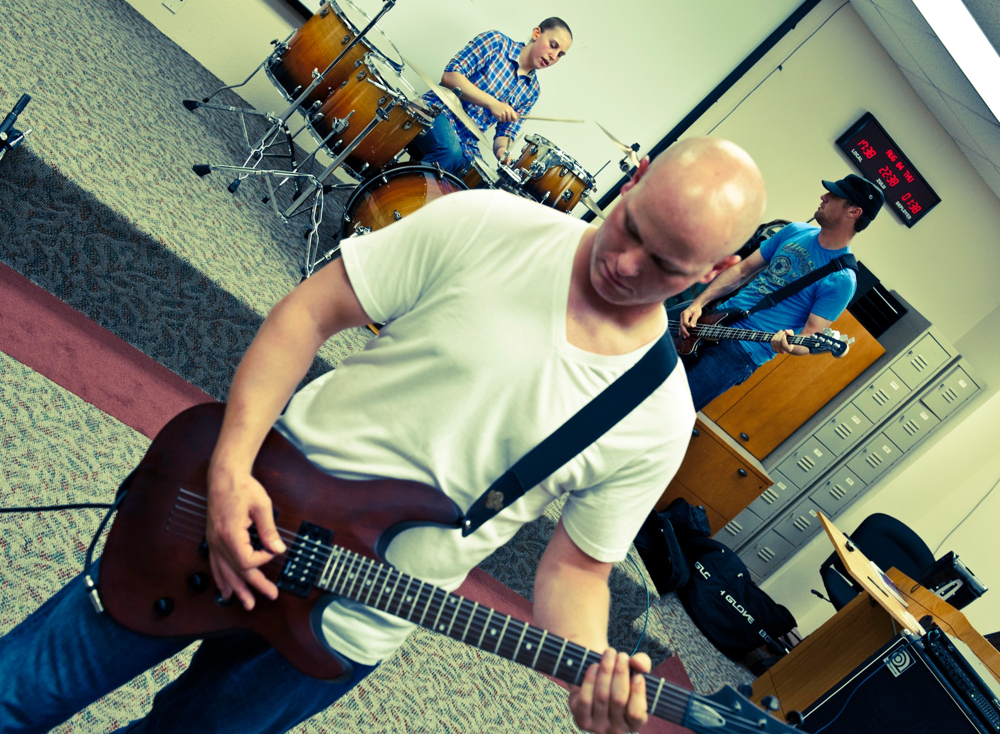 Members of the band, Sonic Cell, begin a new song during a practice session on Eglin Air Force Base, Fla.  The four-person alternative rock band is made up of enlisted Airmen from the 96th Air Base Wing.  (U.S. Air Force photo/Samuel King Jr.)