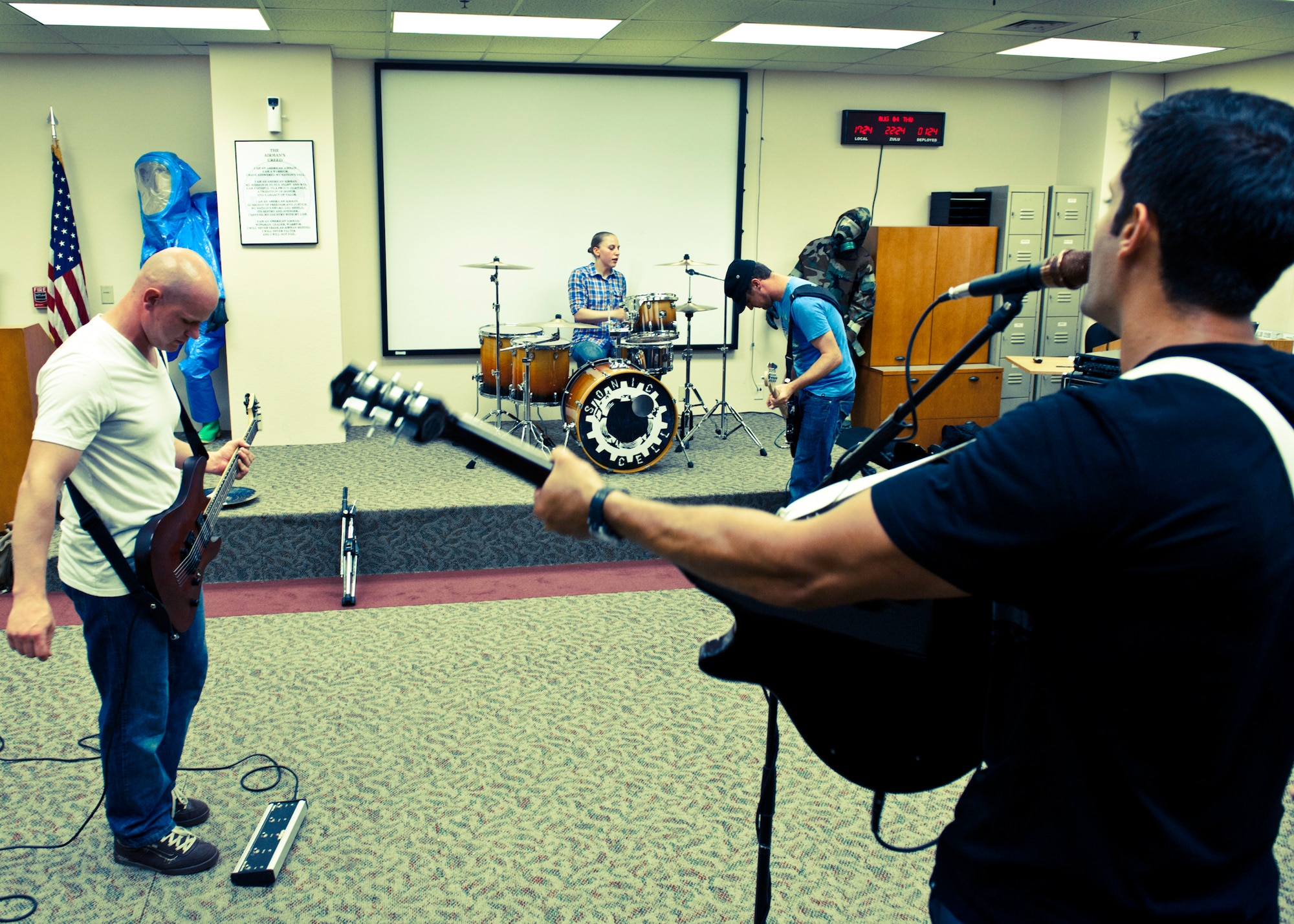 The members of Sonic Cell practice at the 96th Civil Engineer Squadron readiness building at Eglin Air Force Base, Fla.  The four-person alternative rock band is made up of enlisted Airmen from the 96th Air Base Wing.  (U.S. Air Force photo/Samuel King Jr.)