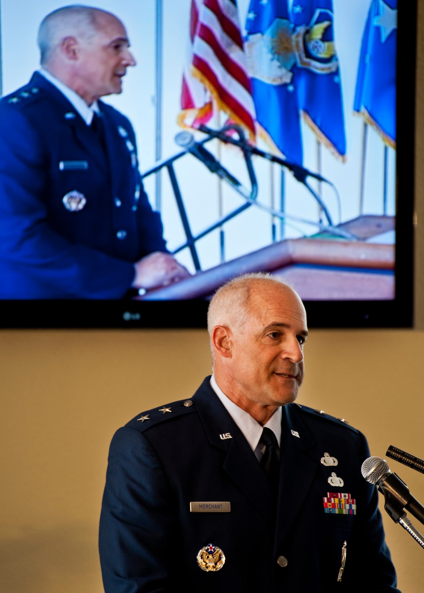 Maj. Gen. Kenneth Merchant addresses his wings and local community leaders for the first time as commander of the Air Armament Center during his change of command ceremony at Eglin Air Force Base, Fla., Aug. 19.  Merchant took command of the center from Maj. Gen. Charles R. Davis.  (U.S. Air Force photo/Samuel King Jr.)