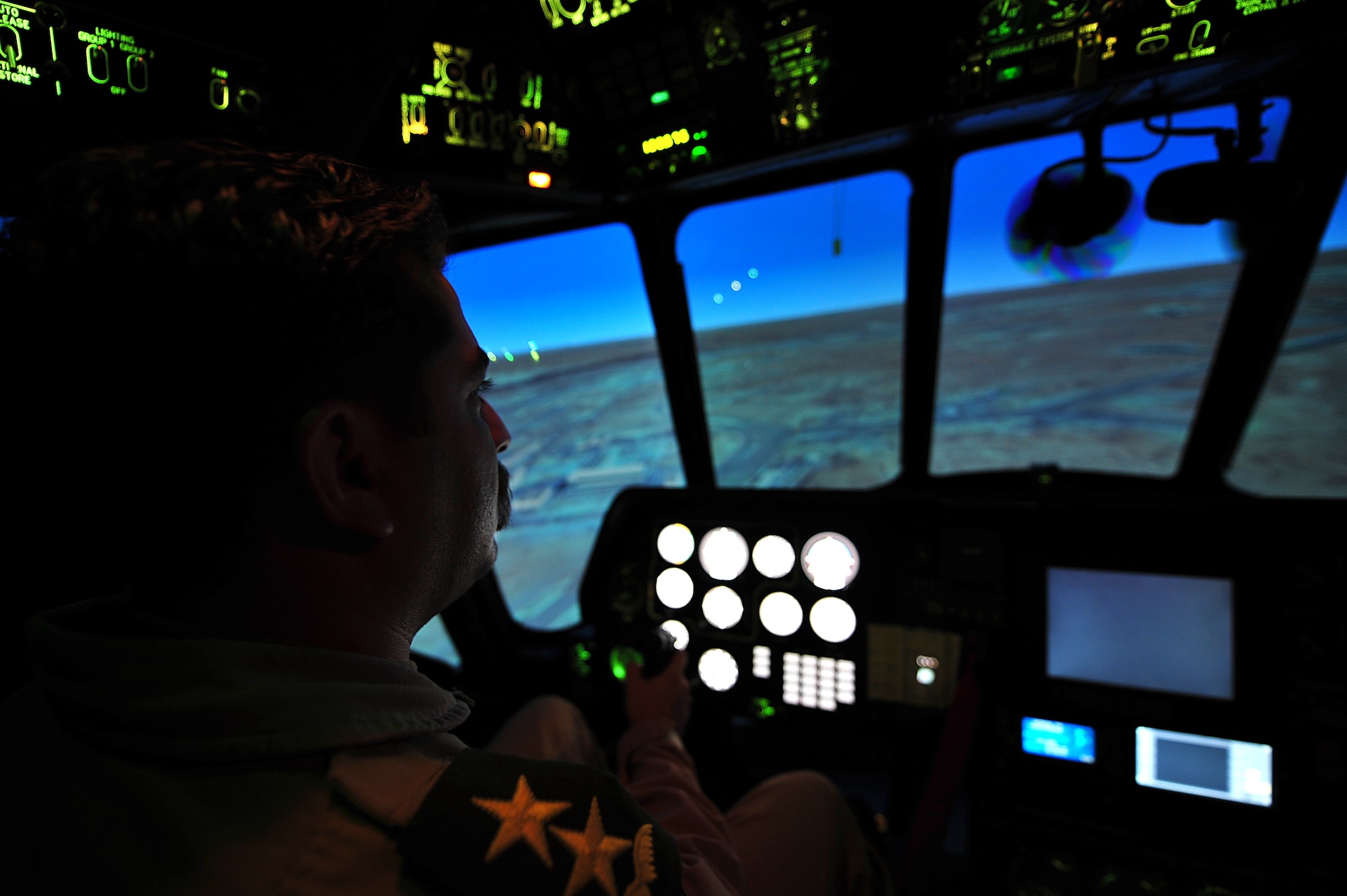An Iraqi Army Aviation Command pilot flies a MI-171 helicopter simulator at Taji Air Base, Iraq, Aug. 10, 2011. The new $4.8 million simulator provides invaluable training to Iraqi Army Aviation Command pilots, allowing them to experience multiple flight scenarios, including emergency conditions in a controlled, safe environment. (U.S. Air Force photo/Tech. Sgt. Josef Cole)