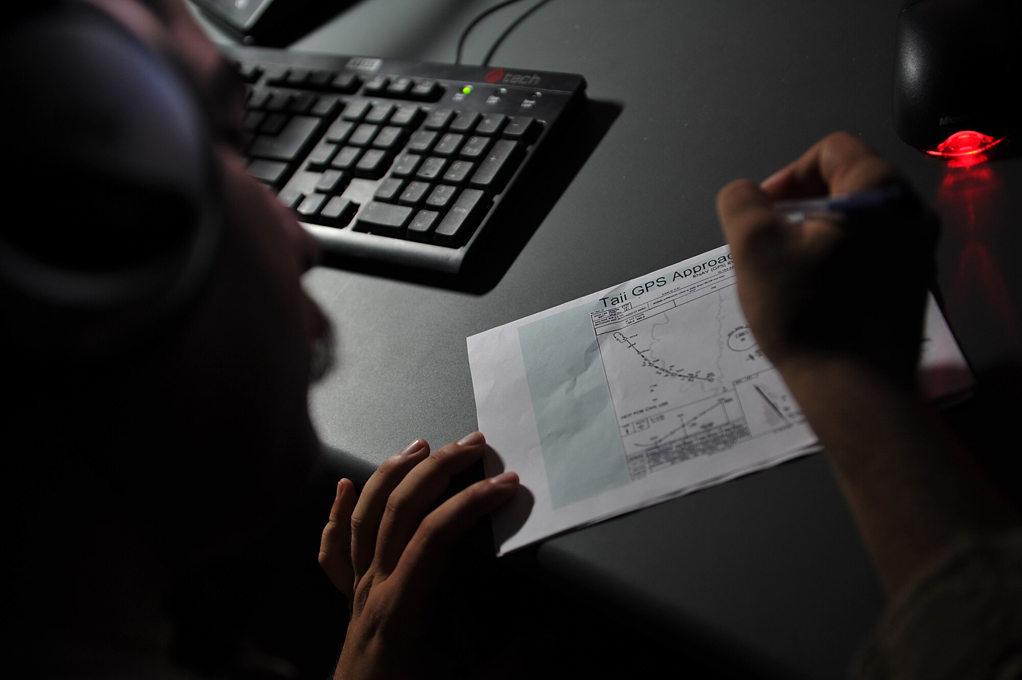 An Iraqi pilot studies a flight plan before programming it into a MI-171 helicopter simulator at Taji Air Base, Iraq, Aug. 10, 2011. The new $4.8 million simulator provides invaluable training to Iraqi Army Aviation Command pilots, allowing them to experience multiple flight scenarios, including emergency conditions in a controlled, safe environment. (U.S. Air Force photo/Tech. Sgt. Josef Cole)
