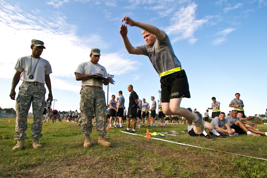 An Army paratrooper completes the long jump for the Army's new physical readiness test on Fort Bragg, N.C., Aug. 10, 2011. The Army's Physical Readiness Division is gathering data on combat and physical readiness tests.