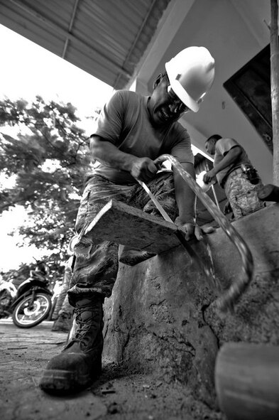 In support of Engineering Civic Action Program (ENCAP) Operation Pacific Unity 11-4, U.S. Navy Seabees from Naval Mobile Construction Battalion 133, Gulfport, Miss., and U.S. Air Force Reserve Prime BEEF Airmen from the 624th Civil Engineer Squadron, Joint Base Pearl Harbor-Hickam, Hawaii, make improvements to three Vietnamese medical clinics in Ha Tinh Province, Vietnam on August 17th. The operation includes more than 60 U.S. and Vietnamese service members, local contractors and support personnel, and showcases the potential of Total Force Integration and multinational interoperability. (U.S. Air Force photo/Master Sgt. John Herrick)(Released).