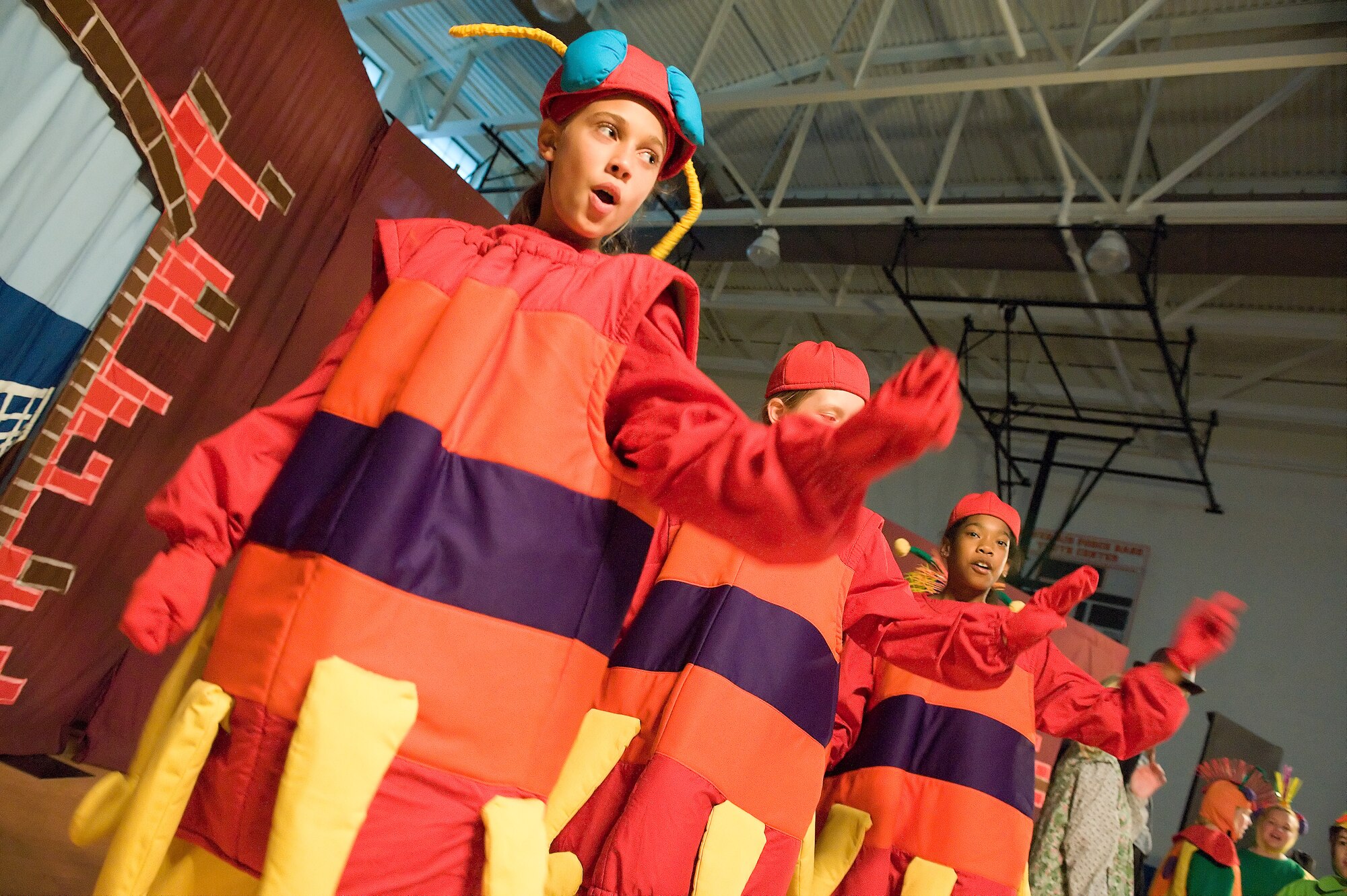 Youth Center members act out a scene from “The Secret Garden” Aug. 19, 2011, at the Youth Center gymnasium. More than 60 children and teenagers participated in the production for more than 160 audience members. (U.S. Air Force photo by Steve Kotecki)