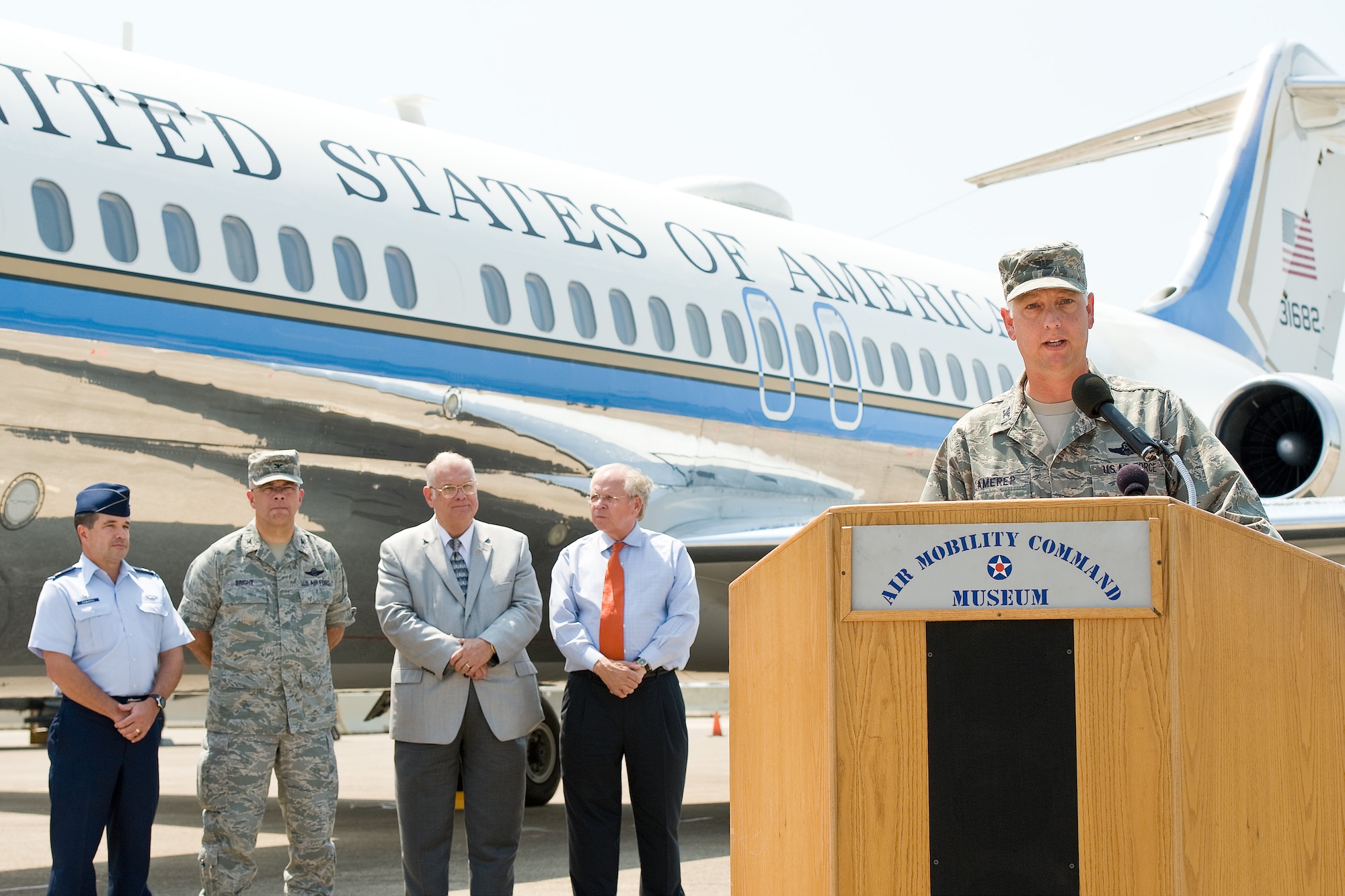 Col. Mark Camerer, the commander of the 436th Airlift Wing, addresses the crowd Aug. 18, 2011, at the Air Mobility Command Museum. The aircraft retired at the AMC Museum after more than 30 years of service. (U.S. Air Force photo by Roland Balik)