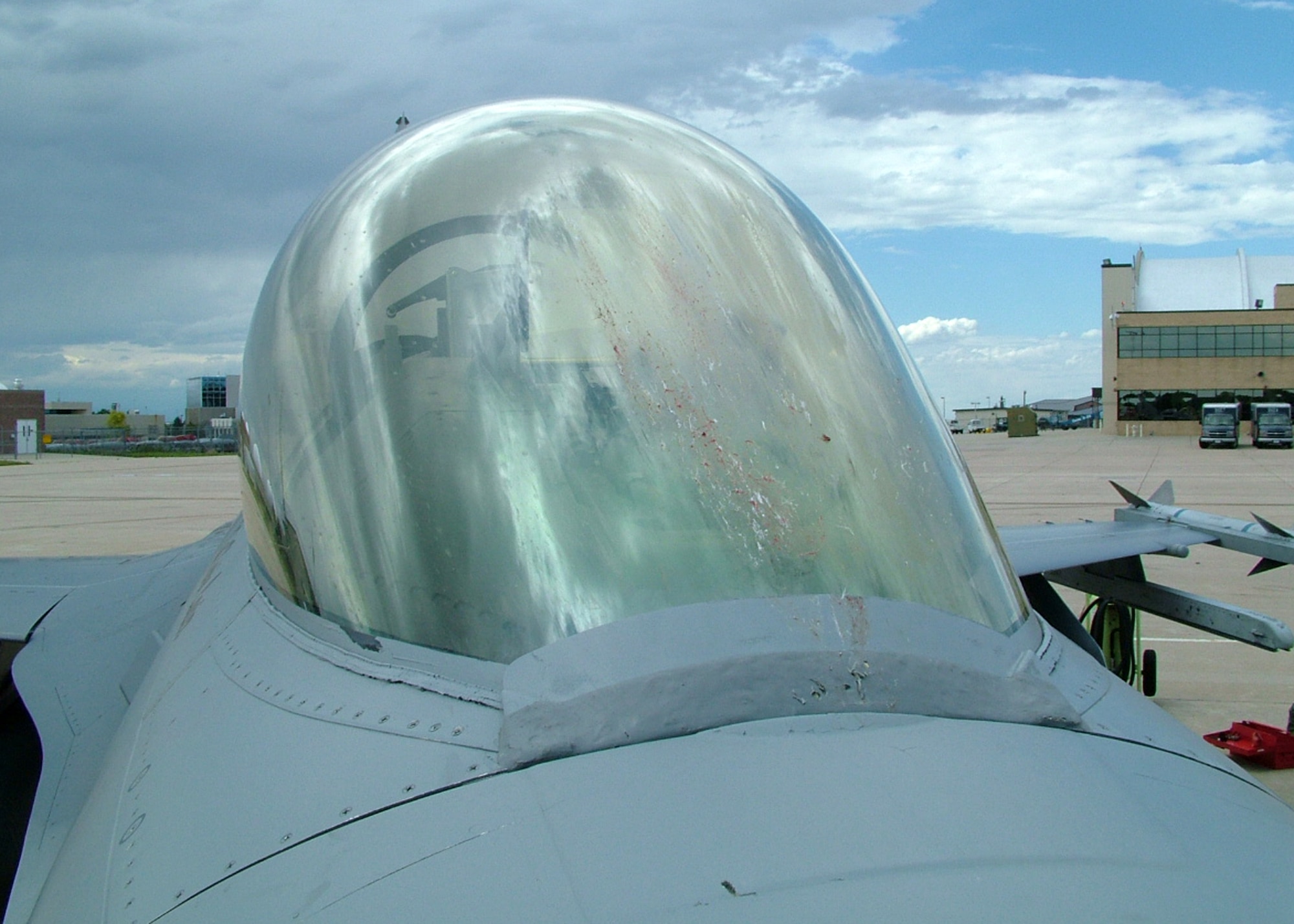 The canopy of a Colorado Air National Guard F-16 displays the remains of a Swainson Hawk that collided with it earlier this year.  The 460th Space Wing and the 140th Wing are aggressively working to reduce the chances of aircraft-bird strikes at Buckley Air Force Base through its Bird Aircraft Strike Hazards (BASH) program. 


