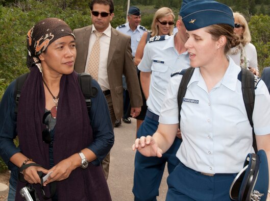 Mardiyah Chamim and Cadet 1st Class Philicia Fahrenbruch talk while walking from the Air Force Academy's visitor center to the Cadet Chapel Aug. 22, 2011. Chamim, the managing editor for TEMPO News Weekly Magazine in Jakarta, Indonesia, was one of seven journalists from Asia and the Pacific to visit the Academy as part of the East-West Center's 2011 Senior Journalists Seminar. Fahrenbruch, is the Cadet Interfaith Council president and is assigned to Cadet Squadron 12. (U.S. Air Force photo/Don Branum)