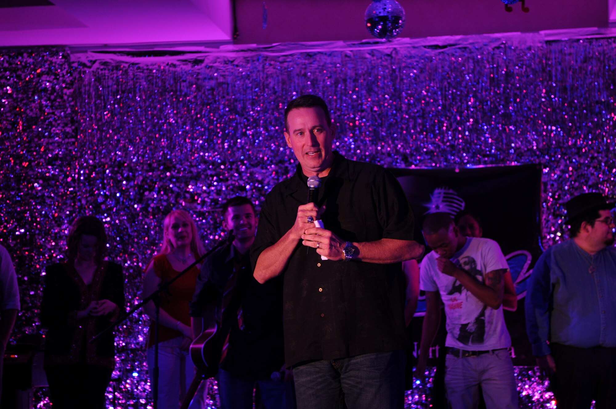 Col. Tim E. Bush, commander of the 319th Air Base Wing, gives thanks and closing remarks at the Air Mobility Command Icon Contest on Grand Forks Air Force Base Aug 18. AMC Icon’s contest is conducted annually and is a great way for GFAFB members to be center stage while highlighting their talents. The AMC Icon’s top performer will represent GFAFB at AMC Headquarters Scott AFB Illinois in October. (U.S. Air Force photo by Senior Airman Amanda N. Stencil)