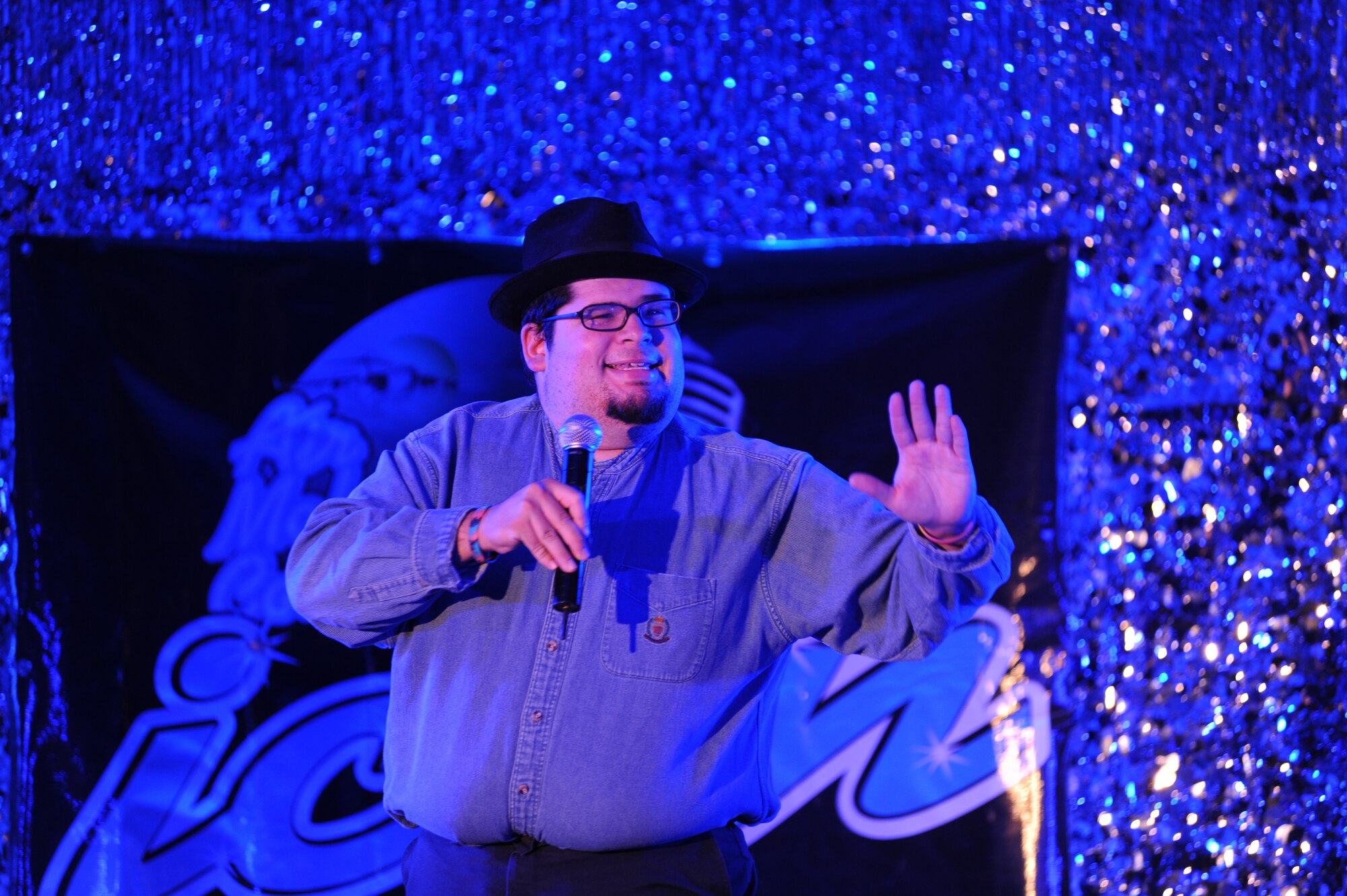 Nate Bennett, member of the 319th Force Support Squadron, performs “You Lost that Loving Feeling” by the Righteous Brothers at the Air Mobility Command Icon Contest on Grand Forks Air Force Base Aug 18. AMC Icon’s contest is conducted annually and is a great way for GFAFB members to be center stage while highlighting their talents. The AMC Icon’s top performer will represent GFAFB at AMC Headquarters Scott AFB Illinois in October. (U.S. Air Force photo by Senior Airman Amanda N. Stencil)
