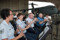 STEWART ANGB, Newburgh N.Y. - Members of the Air National Guard Band of the Northeast play the Air Force Song at the conclusion of the 105th Airlift Wing's C-17 Rollout ceremony. (U.S. Air Force photo by Tech. Sgt. Michael OHalloran) (released)